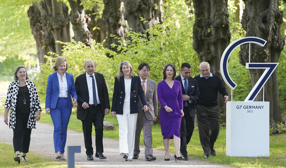 From left, Victoria Nuland, Under Secretary of State and Political Director at the U.S. Department of State, Elizabeth Truss, Foreign Minister of the United Kingdom, Jean-Yves Le Drian, Foreign Minister of France, Melanie Joly, Foreign Minister of Canada, Hayashi Yoshimasa, Foreign Minister of Japan, Annalena Baerbock, Luigi Di Maio, Foreign Minister of Italy, and Josep Borrell, High Representative of the EU for Foreign Affairs and Security Policy, walk at the summit of foreign ministers of the G7 group of leading democratic economic powers, in Weissenhäuser Strand, Thursday, May 12, 2022. The meeting under German presidency will be chaired by Foreign Minister. In addition to the USA and Germany, the G7 also includes Great Britain, France, Italy, Canada and Japan. (Marcus Brandt/pool photo via AP)