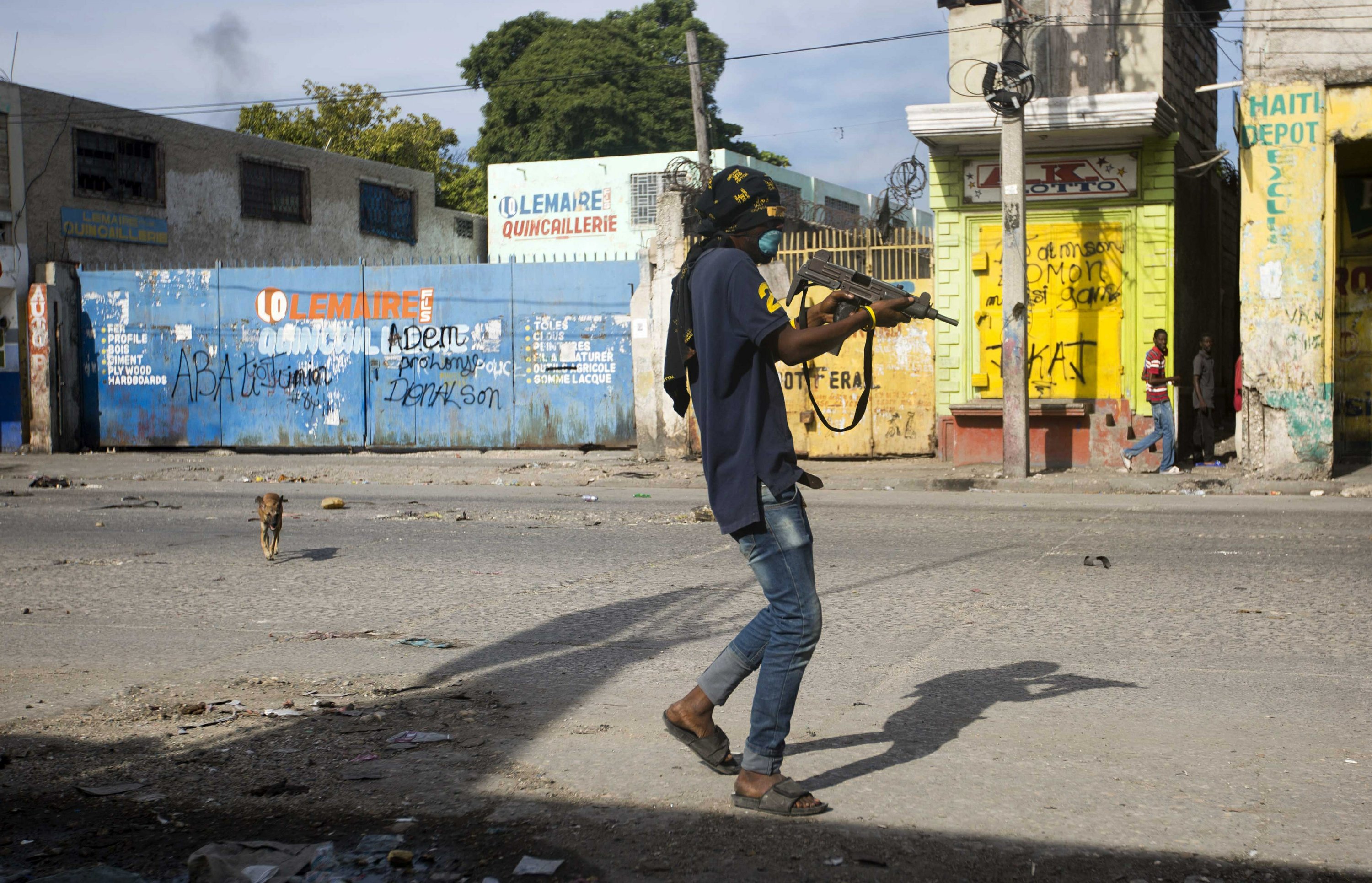 Protesters clash with police in Haiti as death toll rises