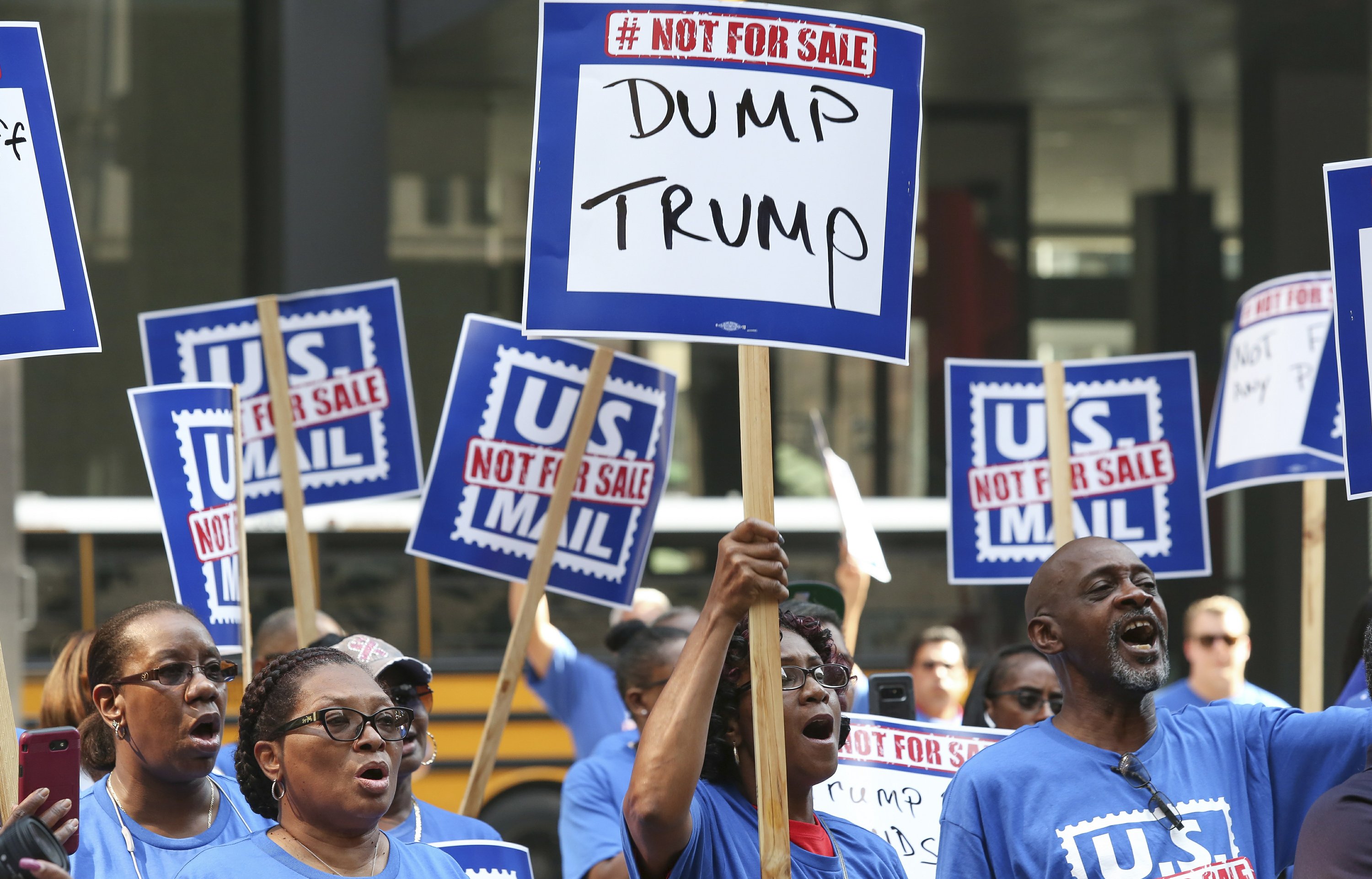 Workers rally amid White House push for postal changes AP News