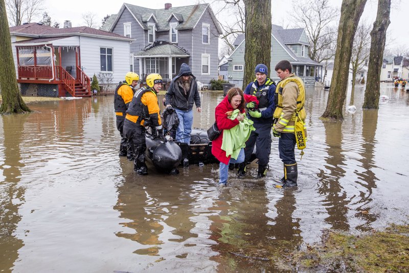 Image result for High water rescues, state of emergency follow nearly a foot of rain, flooding in Wisconsin