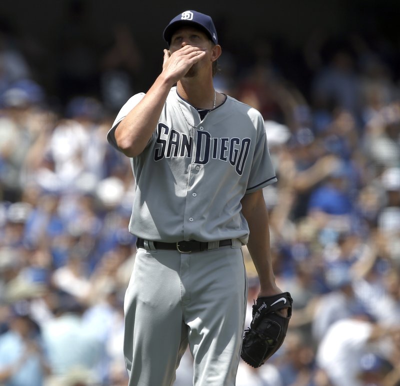 San Diego Padres' pitcher Jered Weaver reacts after Los Angeles Dodgers' Yasiel Puig hits his second two-run home run, of the game, during the fourth inning of a baseball game in Los Angeles, Thursday, April 6, 2017. (AP Photo/Alex Gallardo)