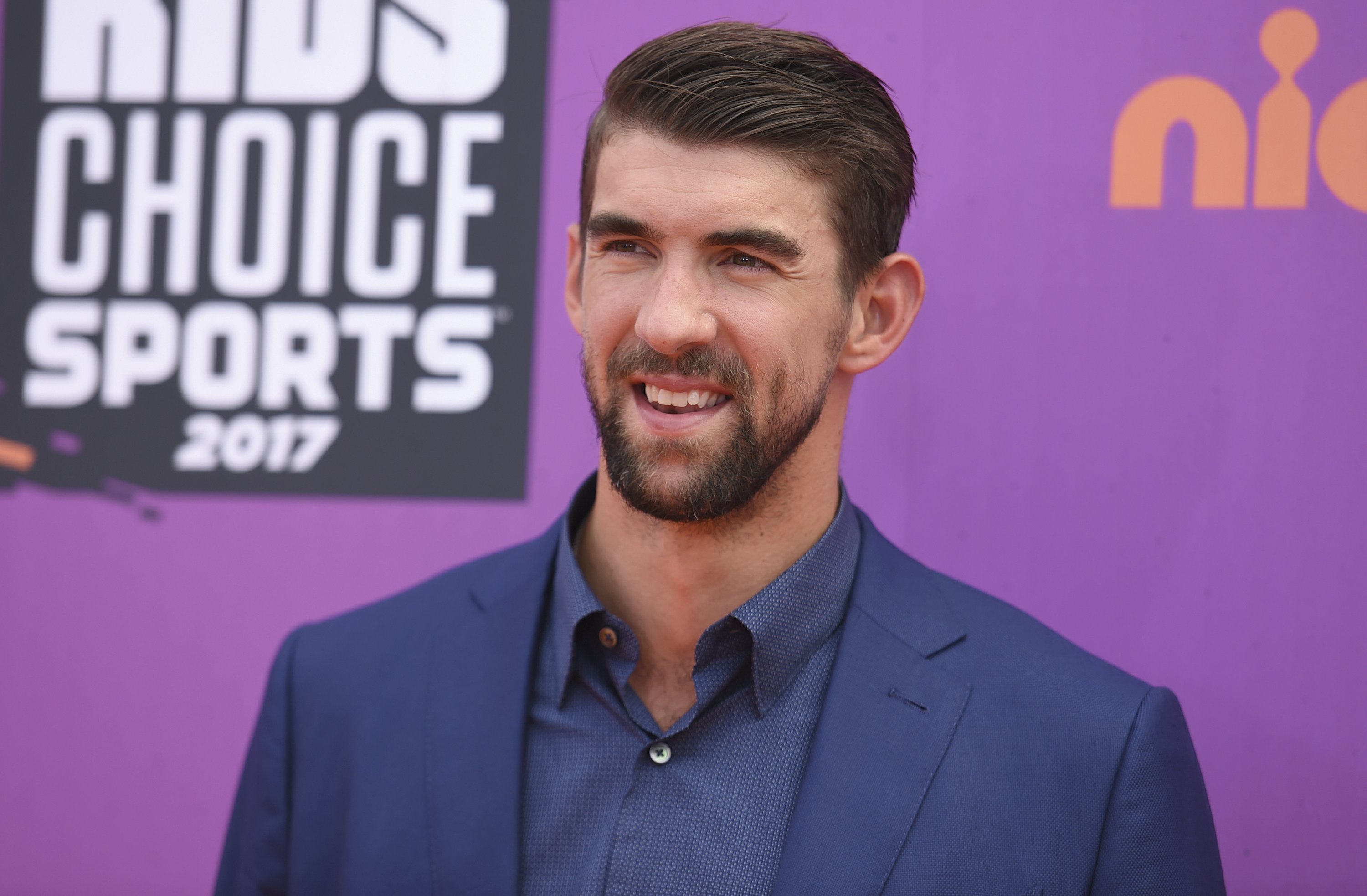Michael Phelps defends Shark Week 'race' against great white AP News