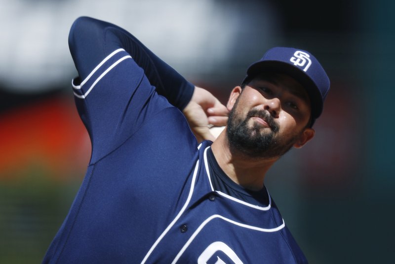 San Diego Padres' starting pitcher Zach Lee delivers a pitch to Colorado Rockies' Carlos Gonzalez in the first inning of a baseball game Wednesday, April 12, 2017, in Denver. (AP Photo/David Zalubowski)