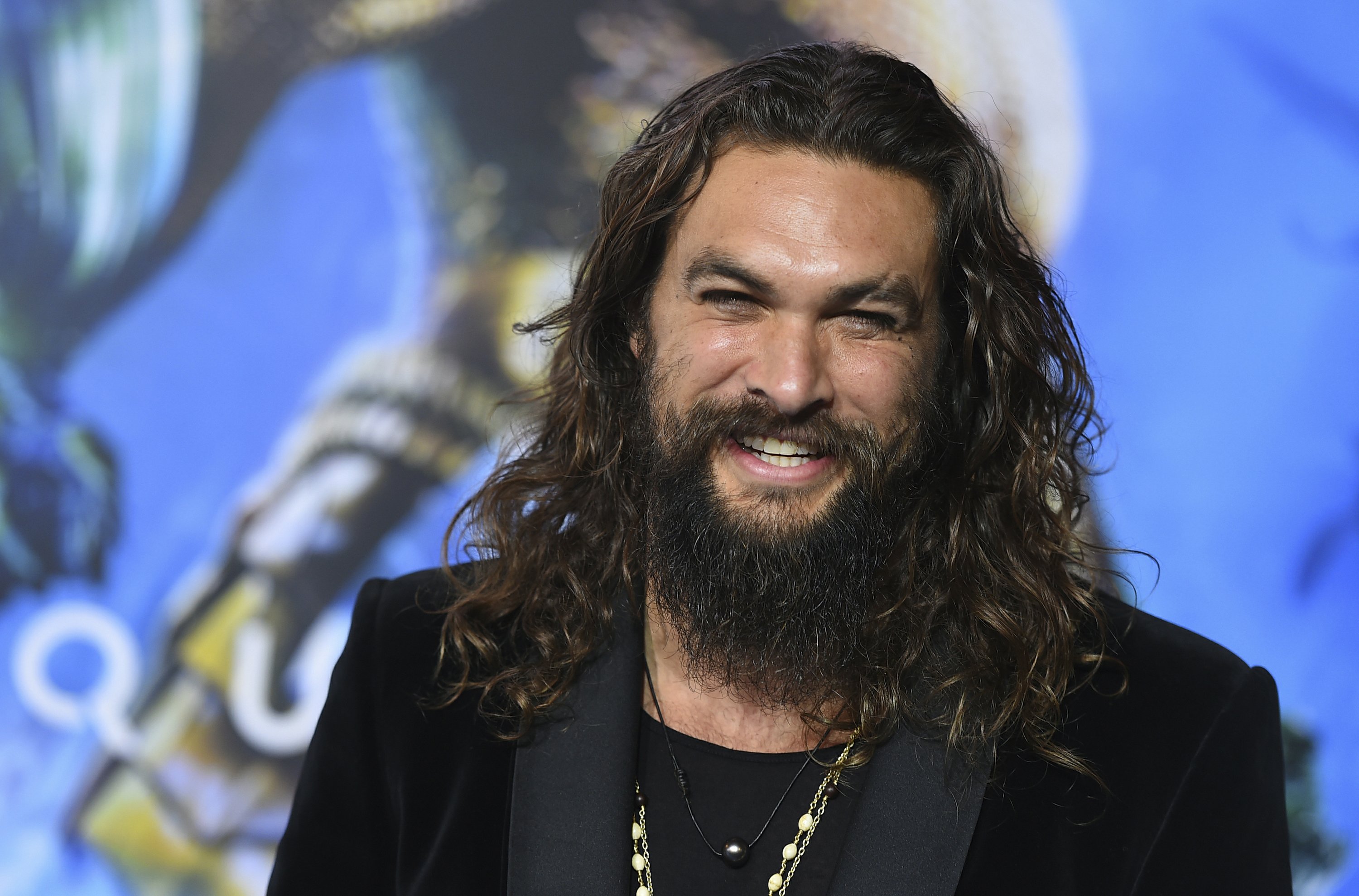 Jason Momoa shaves signature beard to promote recycling AP News