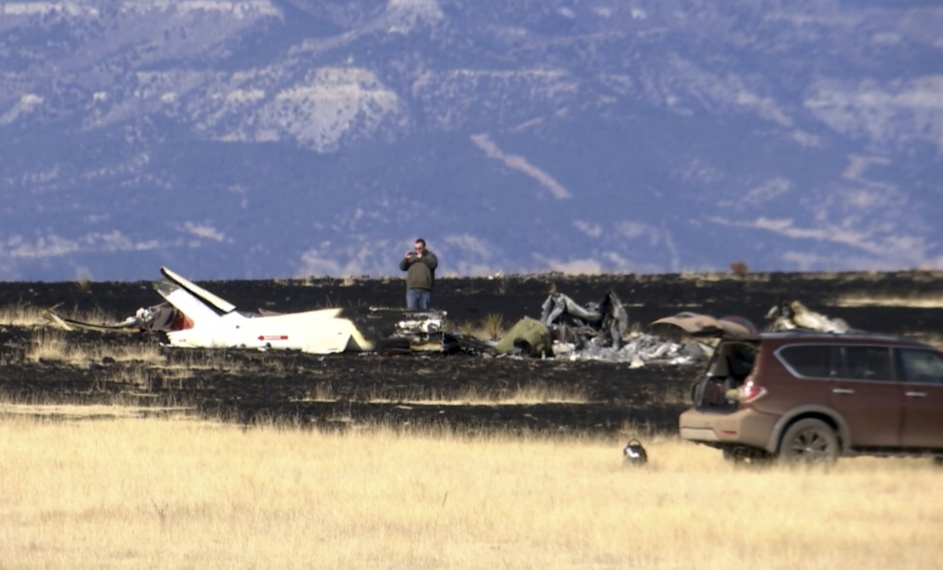'Watching my family burn': Woman frantic after copter crash