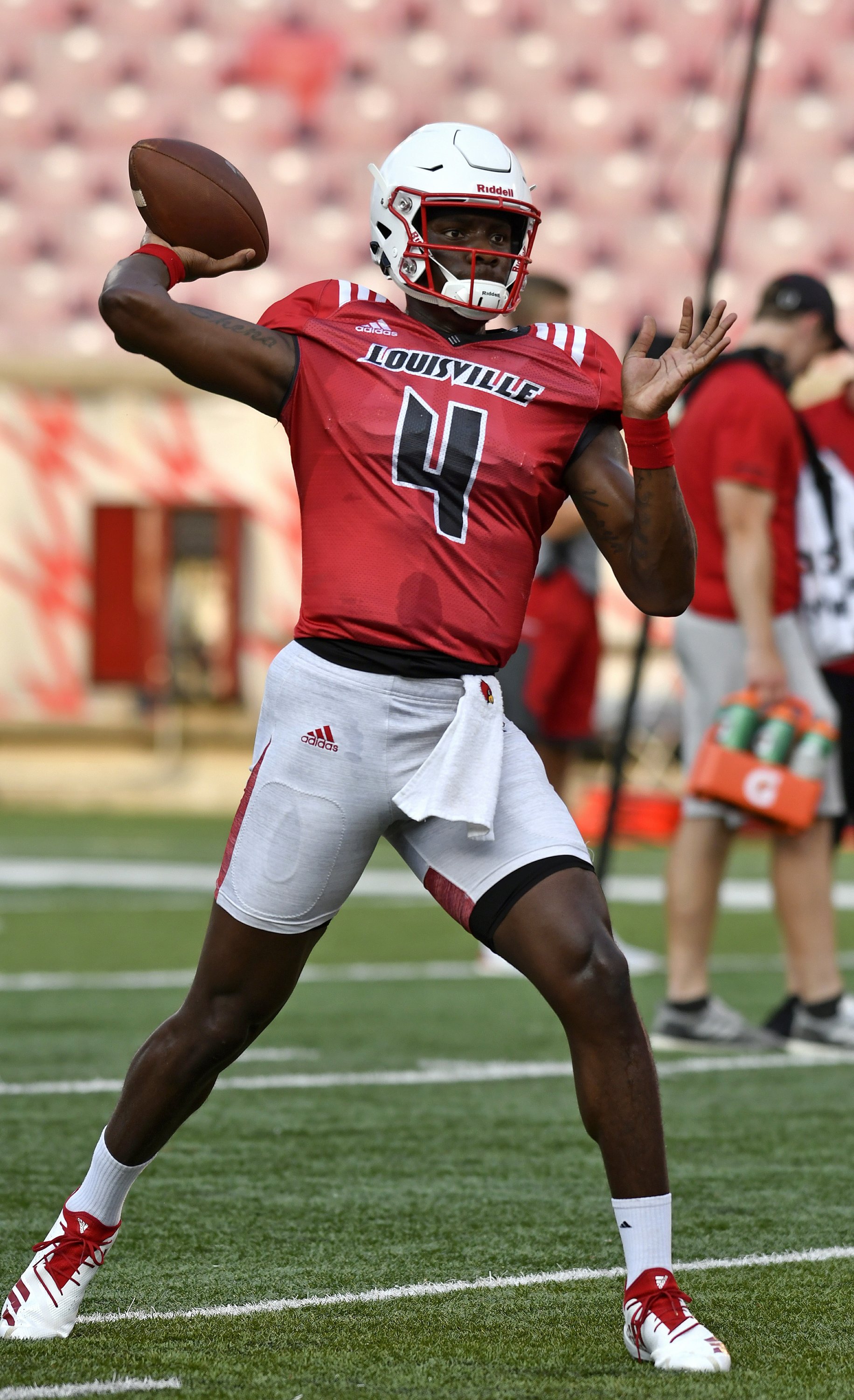 Lamar Jackson Louisville Cardinals Unsigned White Jersey Rolling Away vs. Auburn Tigers Photograph