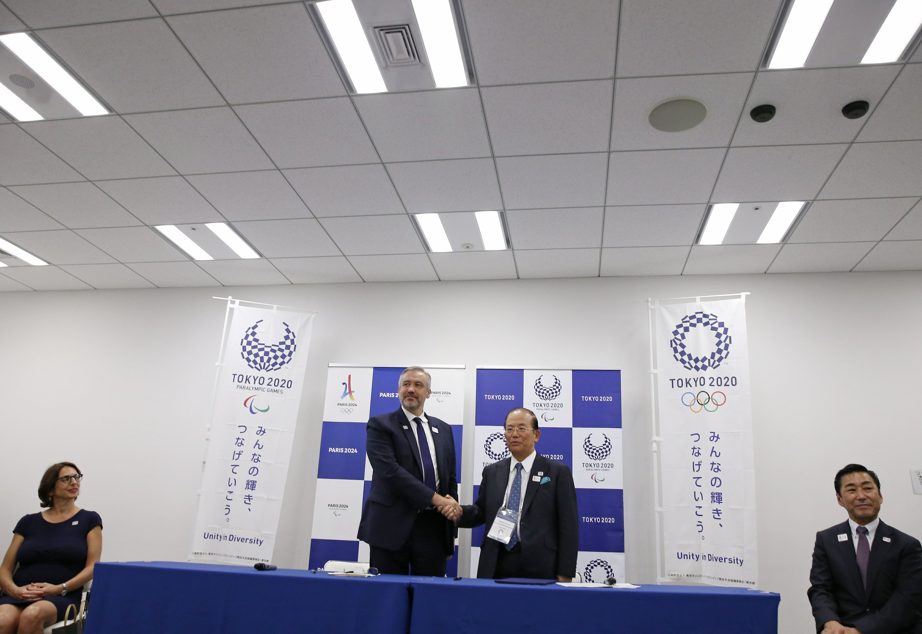 Organizers of 2020, 2024 Olympics sign cooperative agreement AP News
