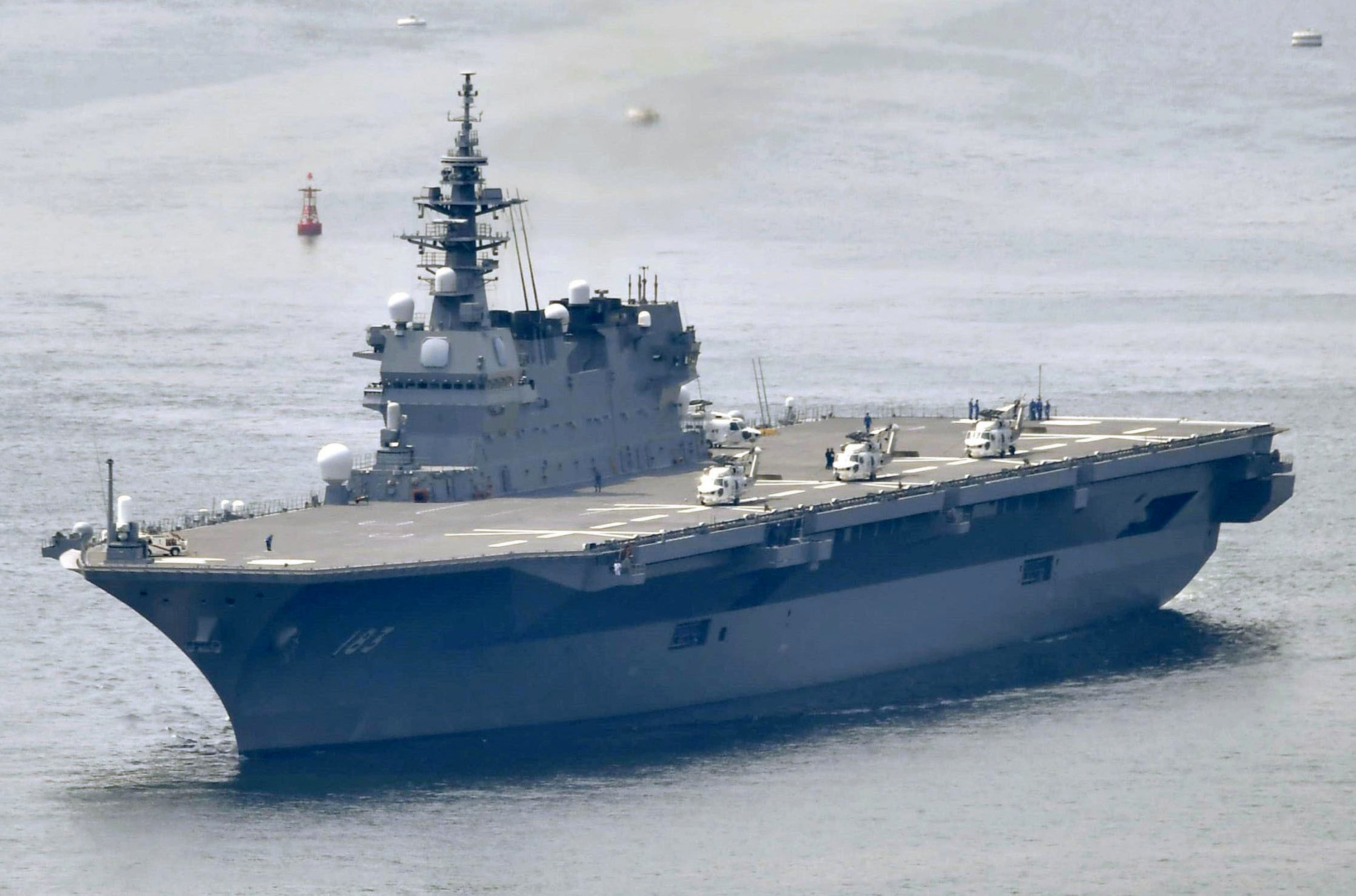 Japan to spend more on defense, refit first aircraft carrier AP News