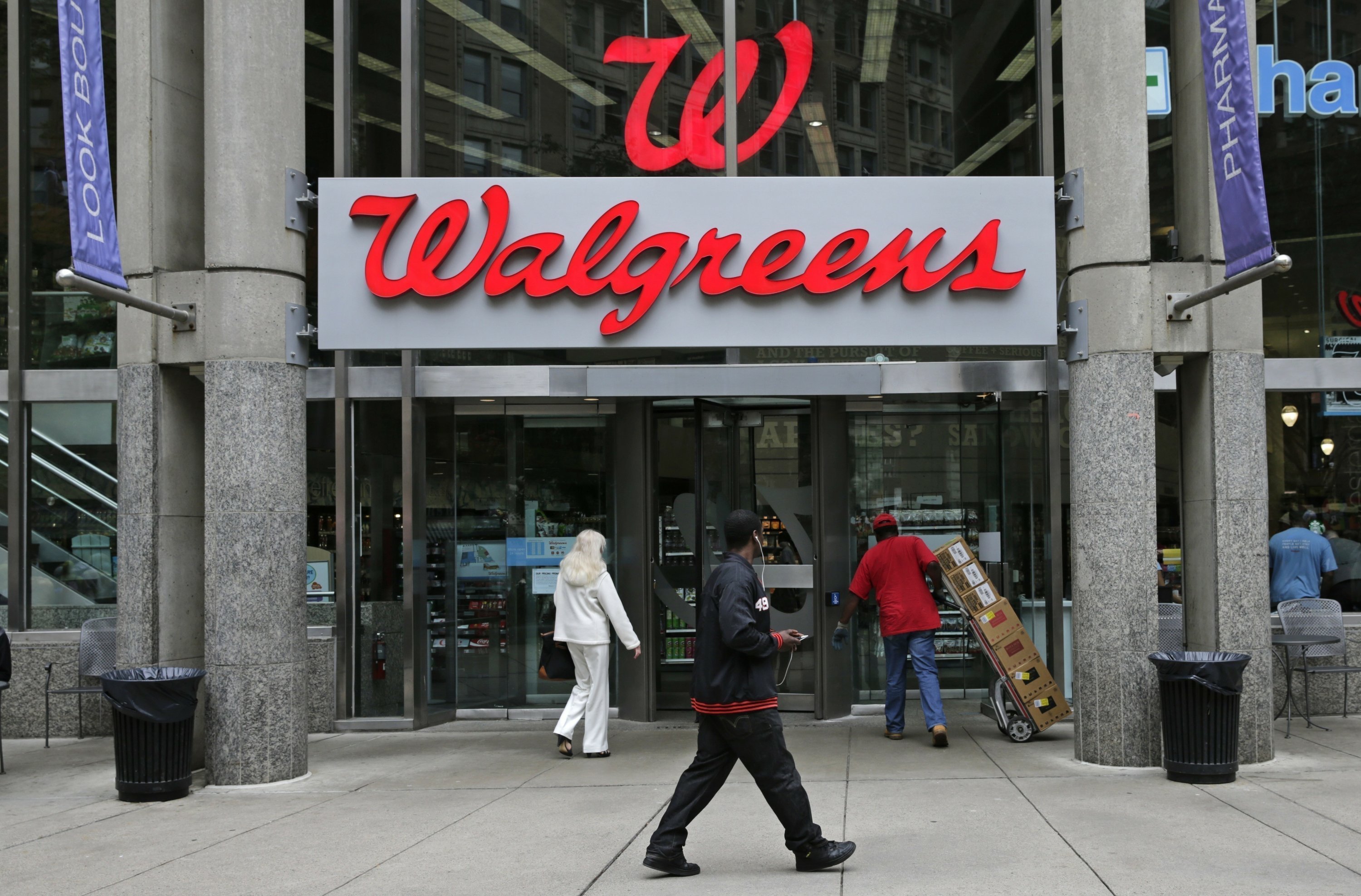 Walgreens tops 3Q forecasts, hikes dividend but stock sinks AP News