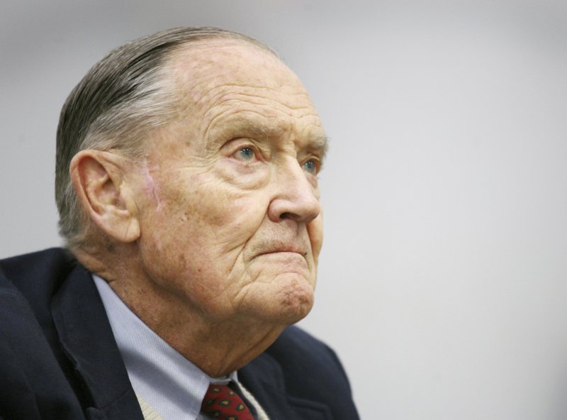 FILE- In this May 20, 2008, file photo John Bogle listens during an interview at The Associated Press in New York. The surge in popularity for index funds is a product of their lower fees, better performance and the preaching of Bogle, the founder of Vanguard Group, which launched the first index mutual fund for individual investors in 1976. Bogle died Wednesday, Jan. 16, 2019, at 89 after pushing for years to keep costs down and widen access to index funds. (AP Photo/Mark Lennihan, File)