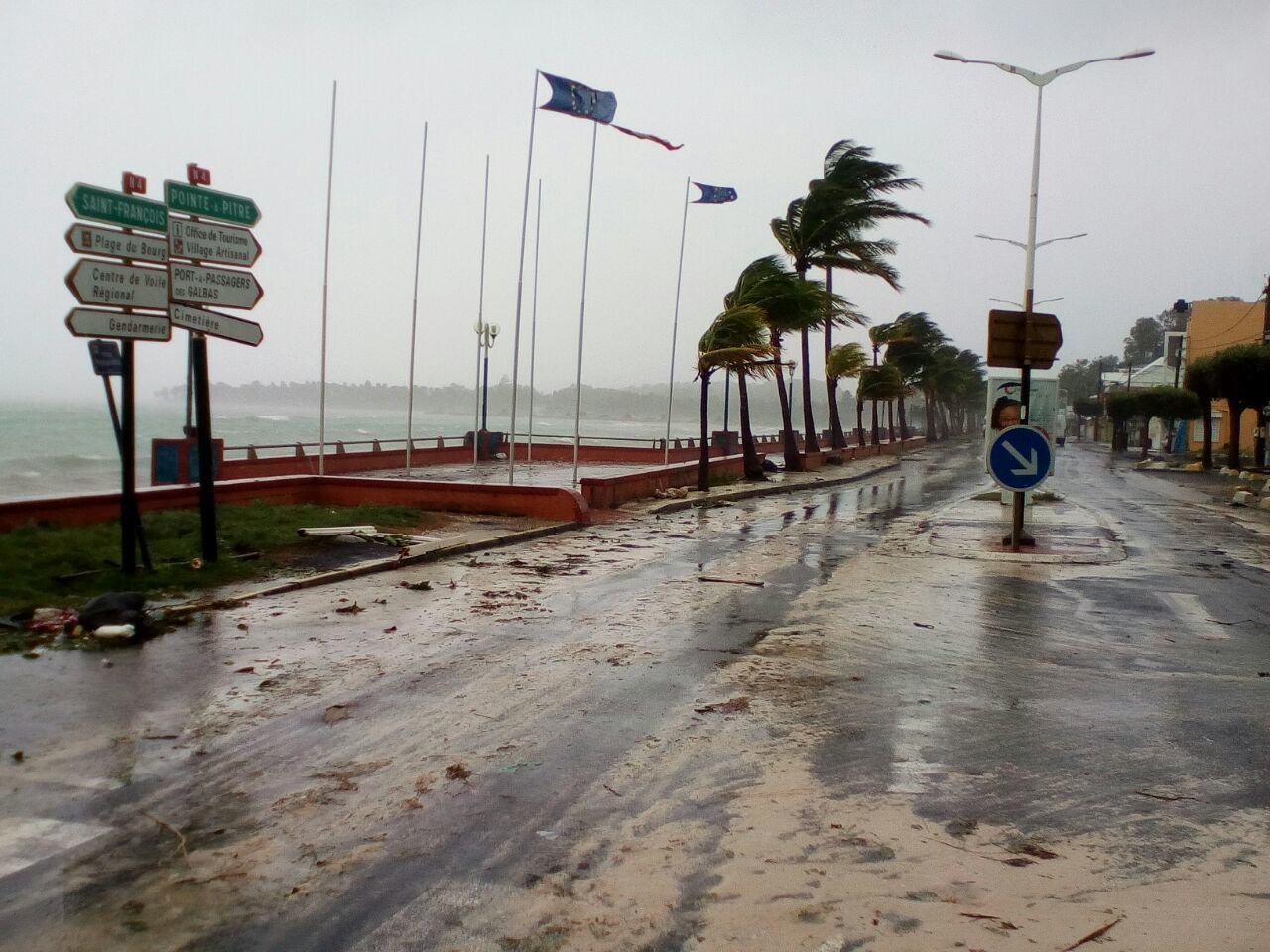 The Latest: 150K without power on 2 French Caribbean islands