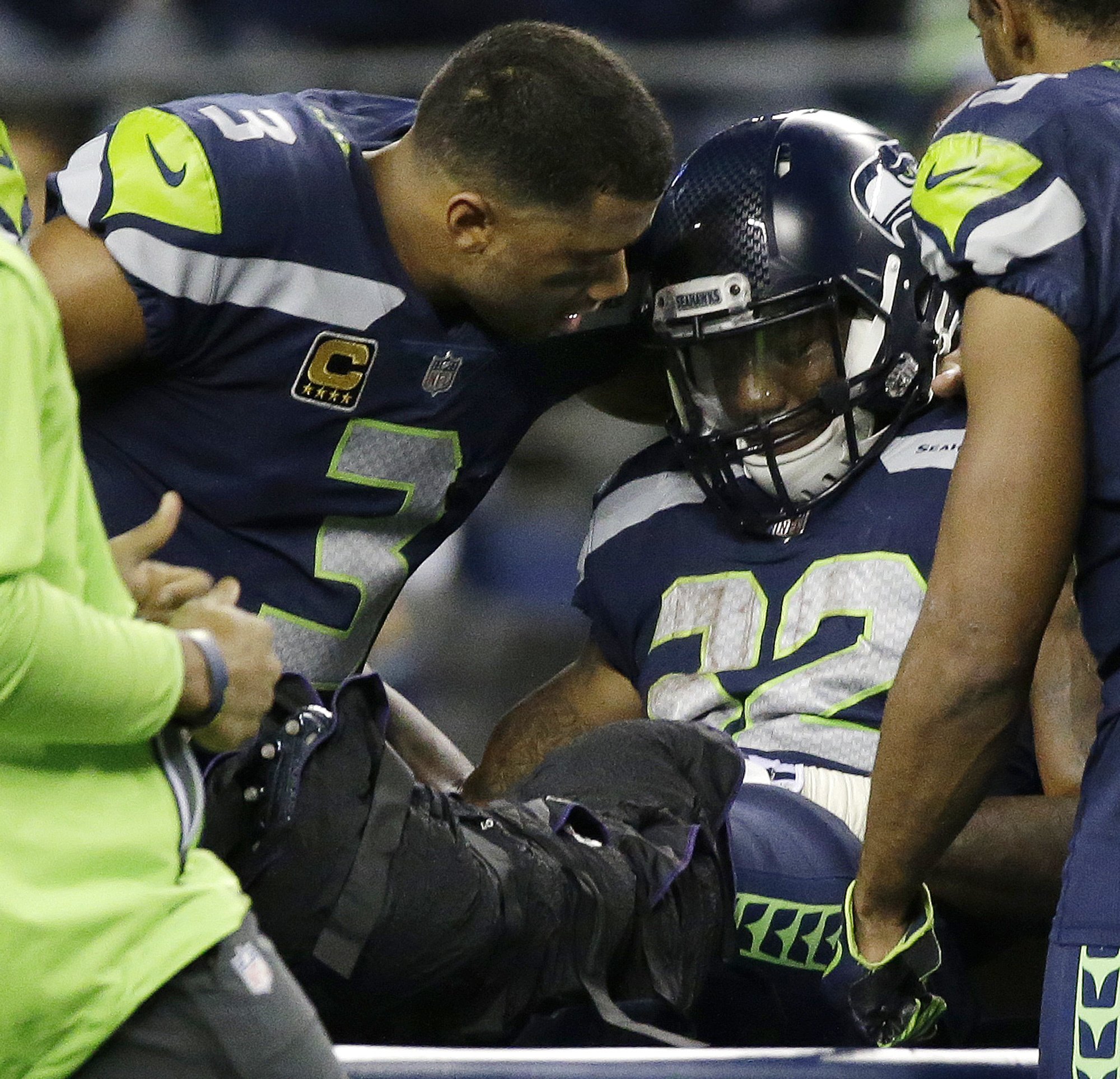 Seahawks lose RB Chris Carson with injury to left leg AP News