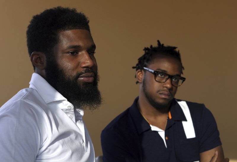 Black men arrested at Starbucks settle with city, company