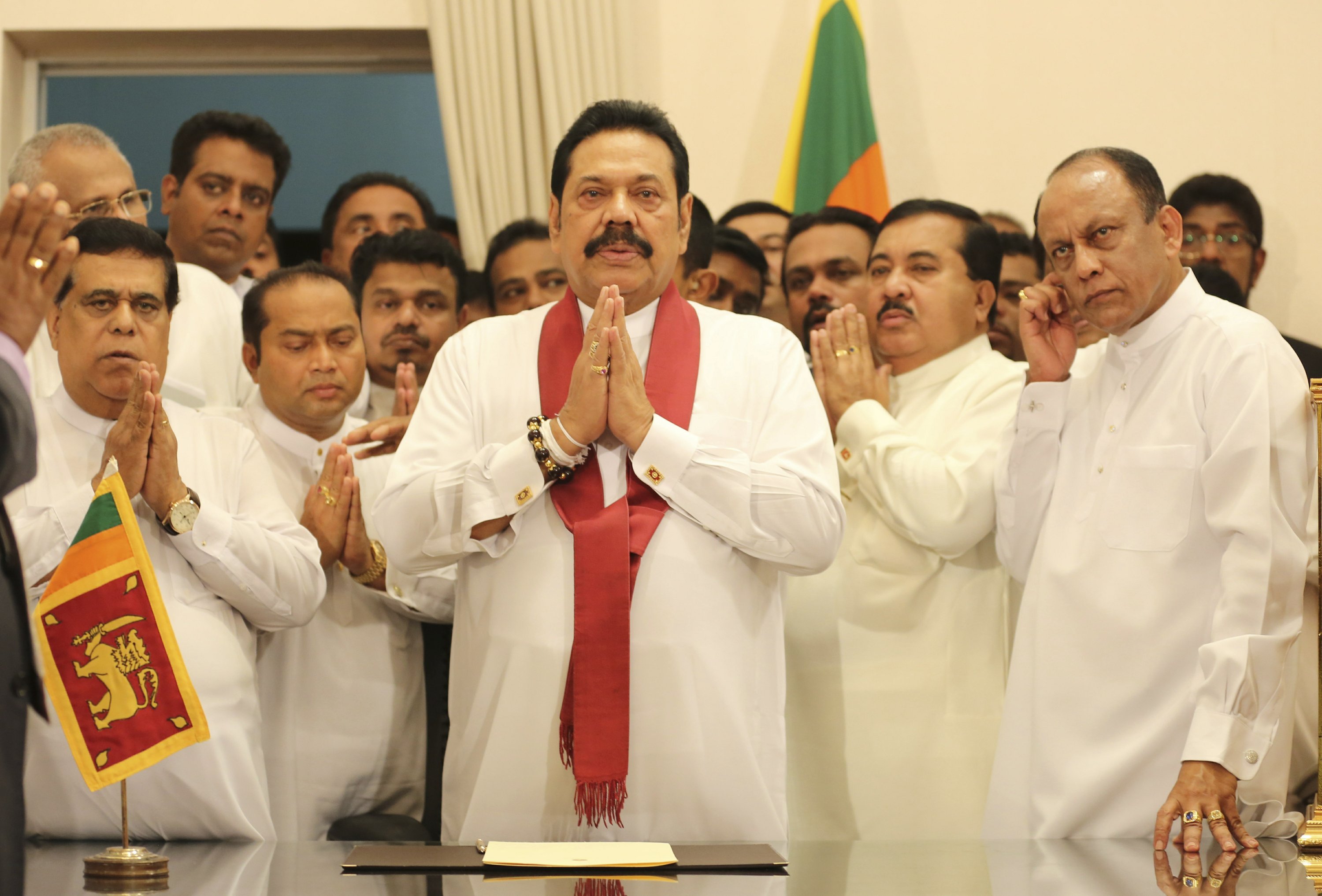 Sri Lanka leader swears in new amid political crisis