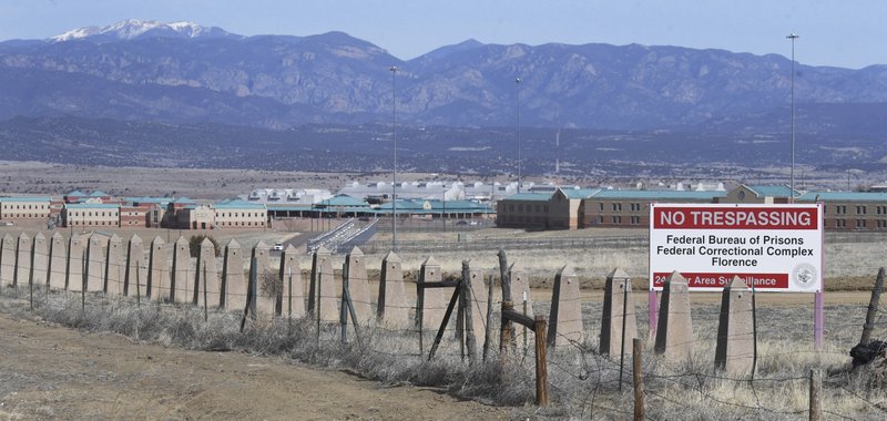 The Rocky Mountains can be seen in the distance behind the Federal Correctional Complex near Florence, Colorado. (Jerilee Bennett/The Gazette via AP)