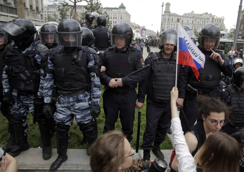 Image result for Moscow protesters march towards Kremlin, but blocked by police