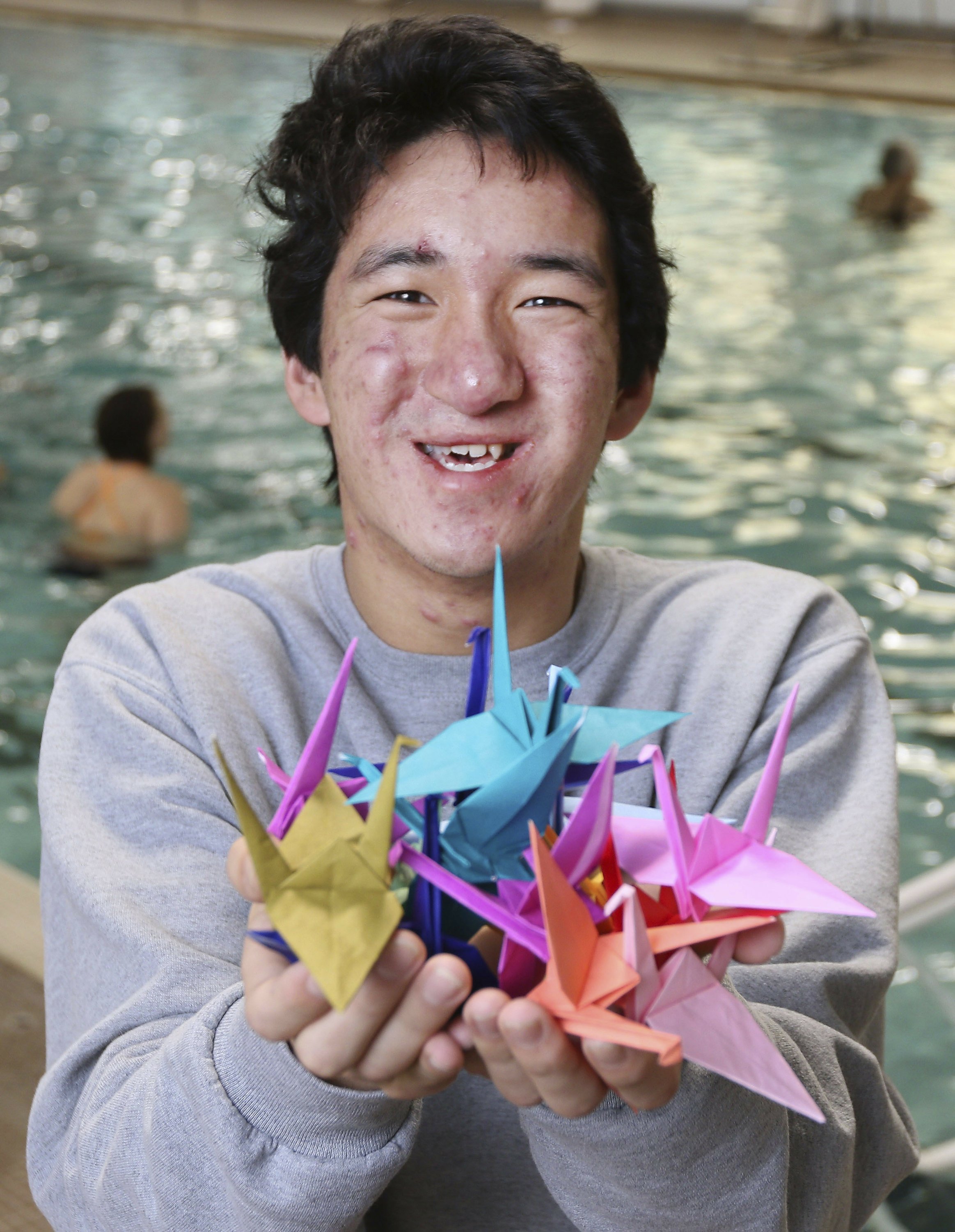 College Freshman Turns Folding Paper Into Crane Birds