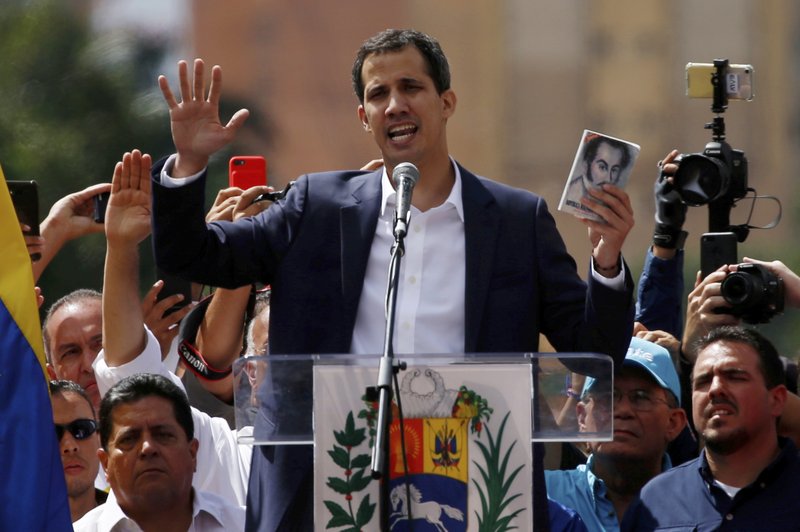 Juan Guaido, head of Venezuela's opposition-run congress, declares himself interim president of Venezuela. (AP Photo/Fernando Llano)