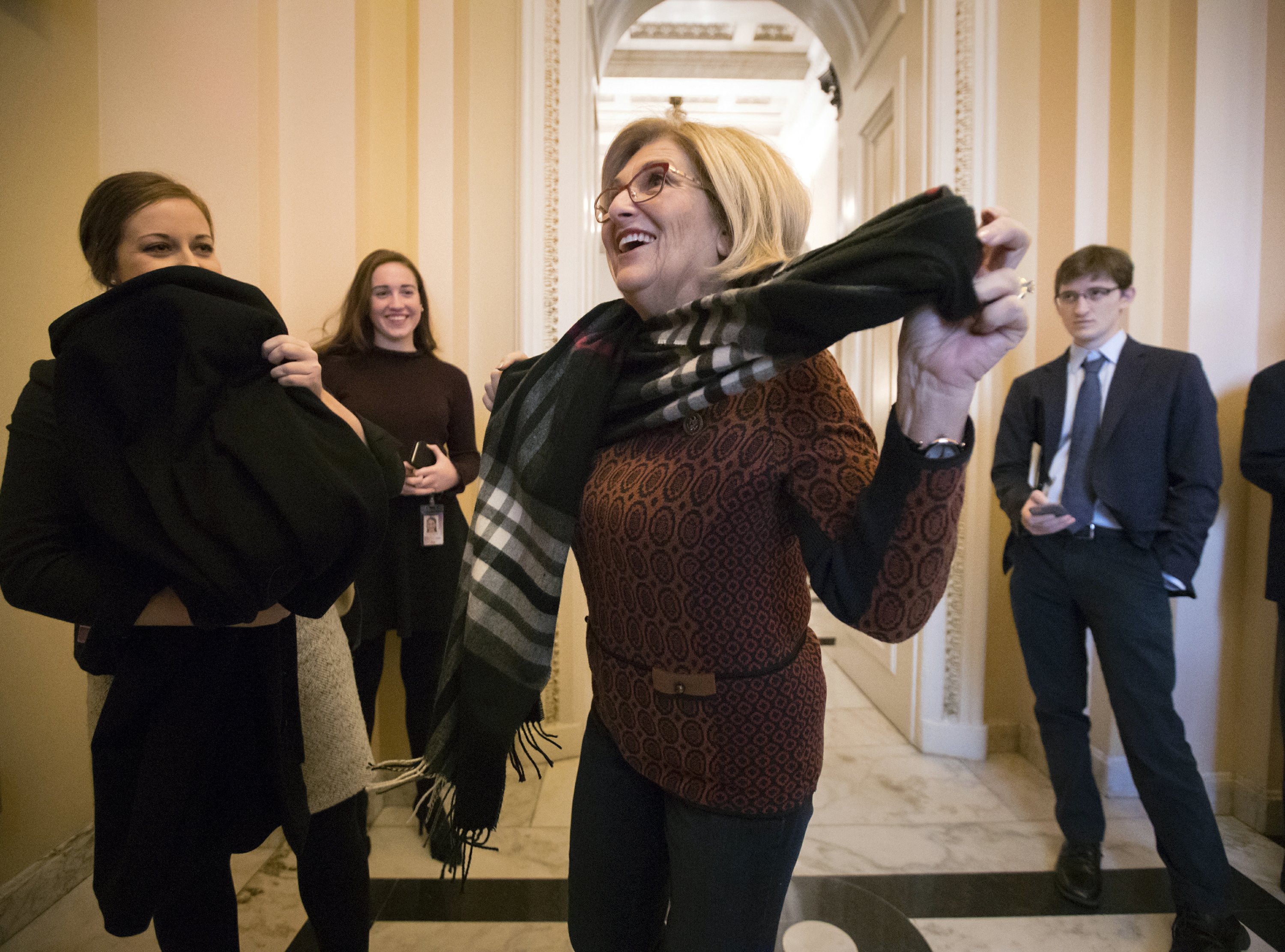 The Latest: Estimate says tax bill adds $1.46T to deficit
