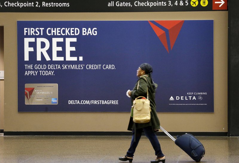 tap checked baggage fee