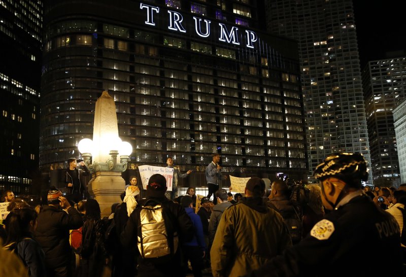 The Latest: Trump on Twitter taking on protesters