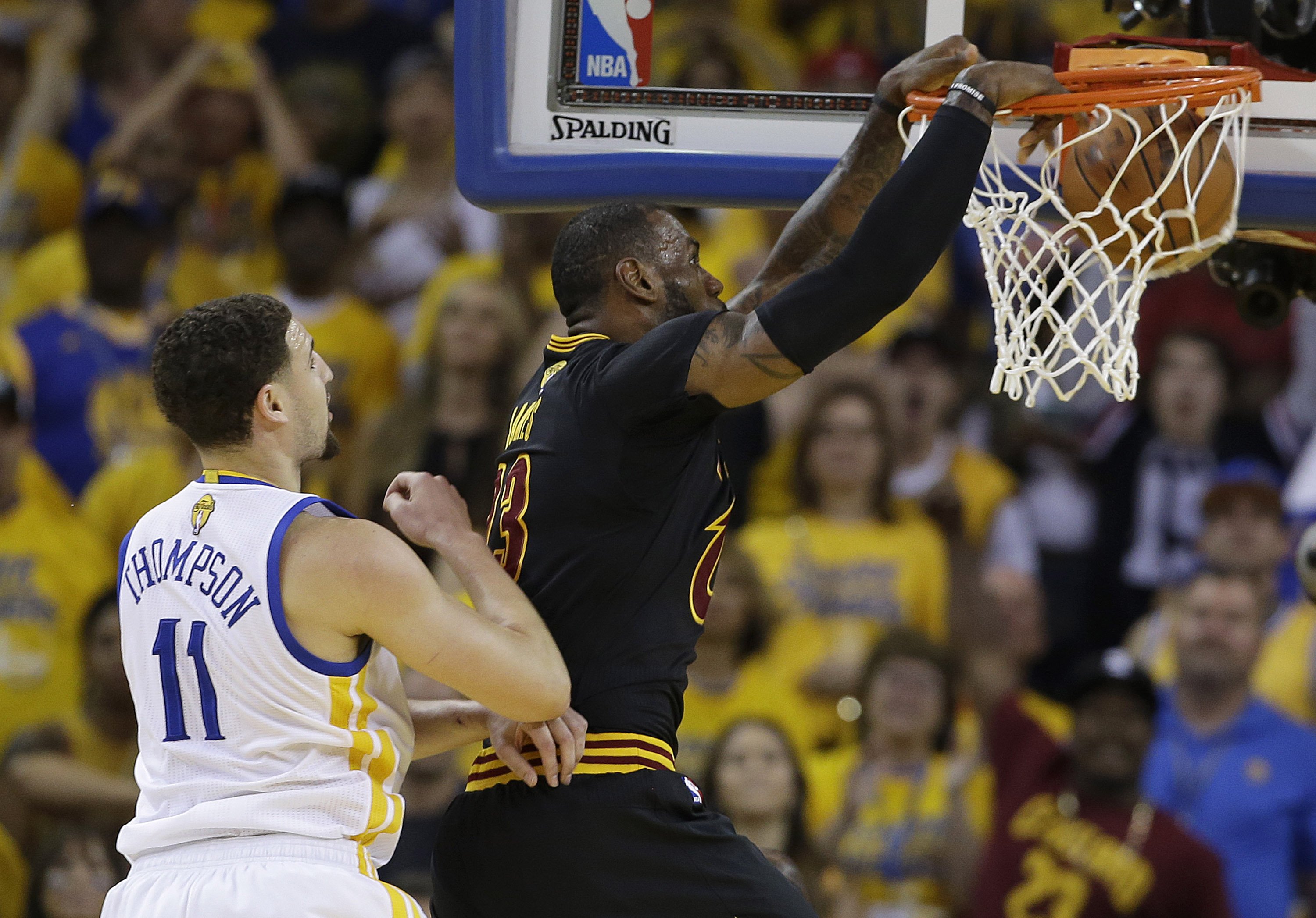 The Latest: LeBron, Cavs beat Warriors 93-89, capture title | AP News