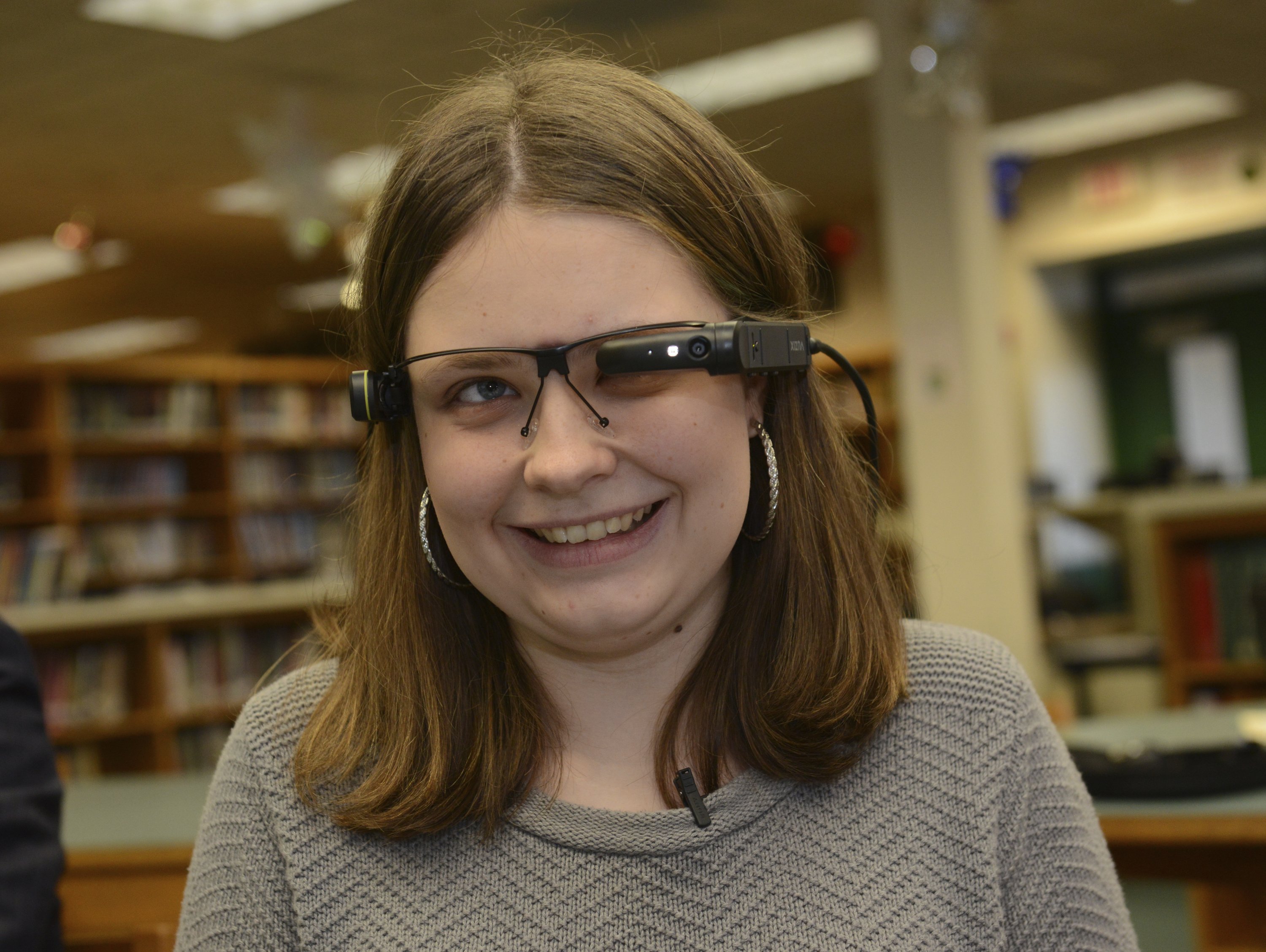 Student receives virtual reality glasses to help sight AP News