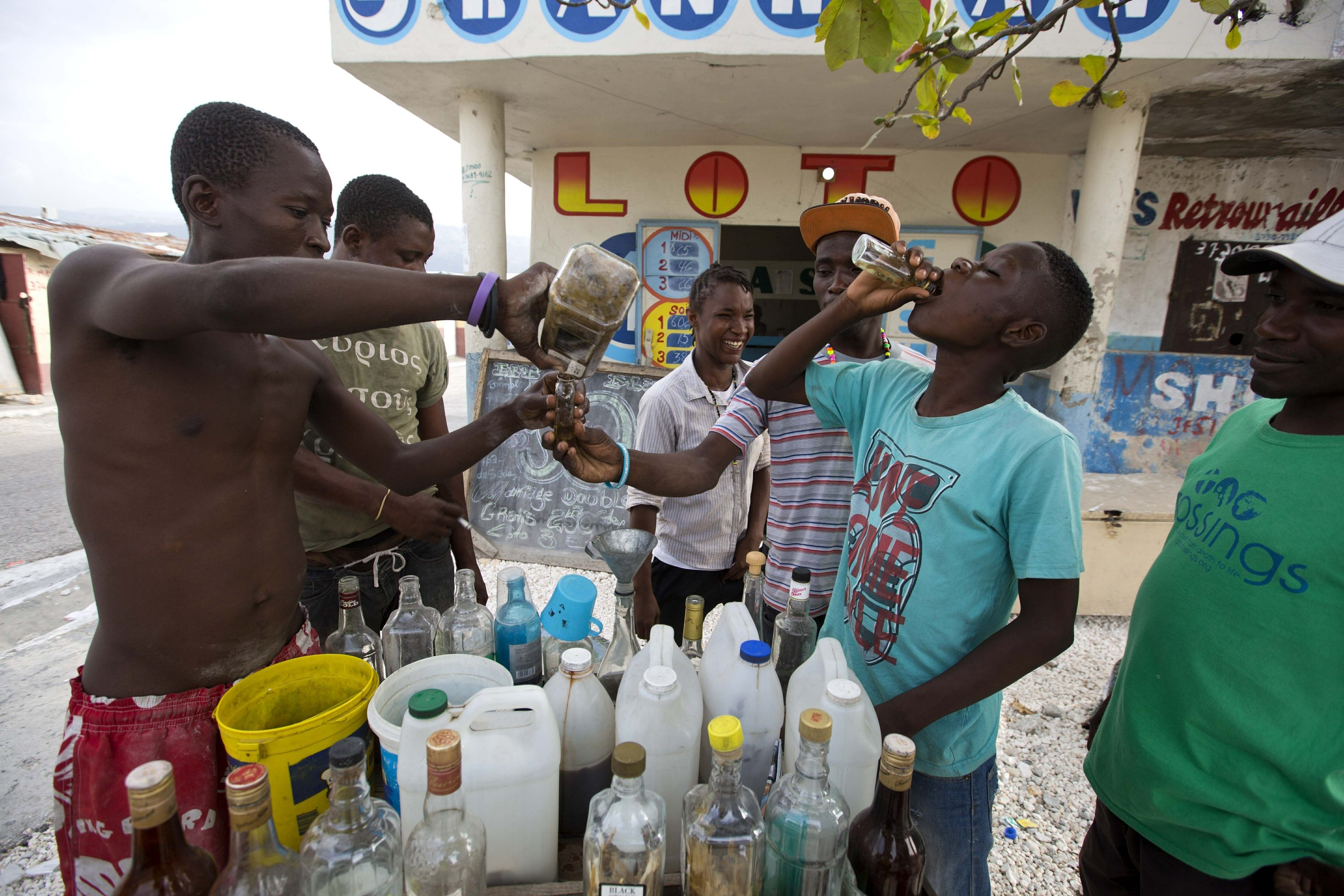 AP PHOTOS Moving Haiti's rustic, rumlike clairin to market AP News