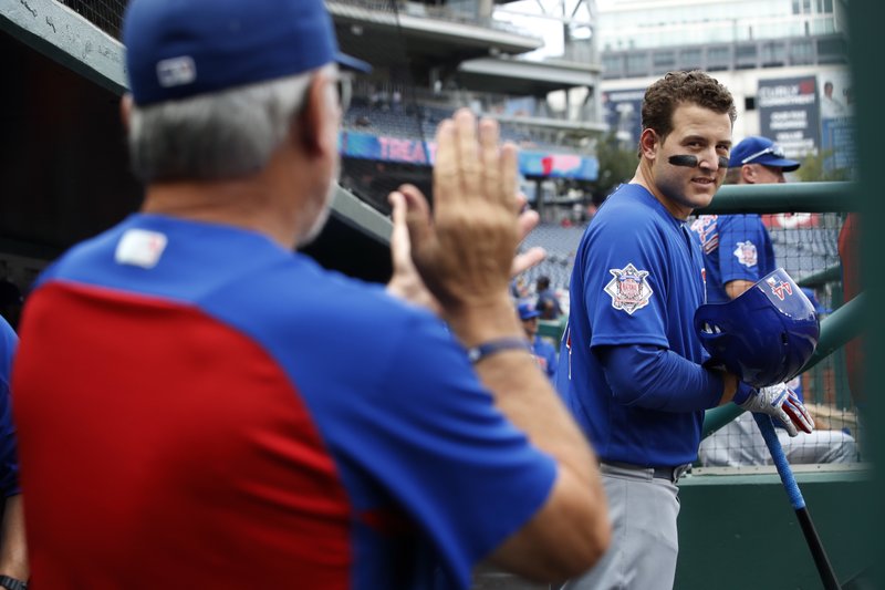 Baez S Bunt Single Lifts Cubs Past Nationals In 10 Innings