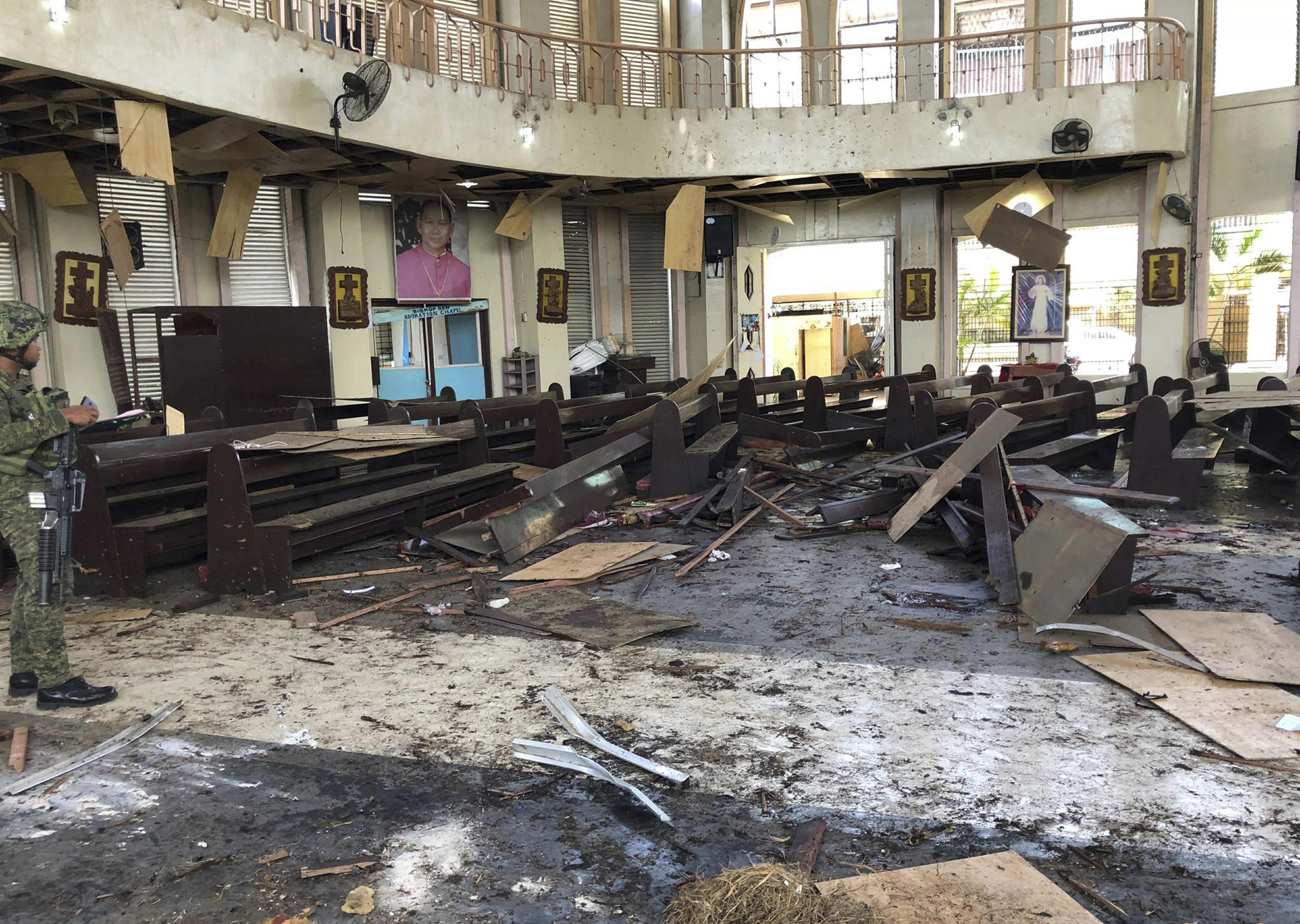 21 dead as bombs target cathedral in southern Philippines 21 dead as bombs target cathedral in southern Philippines