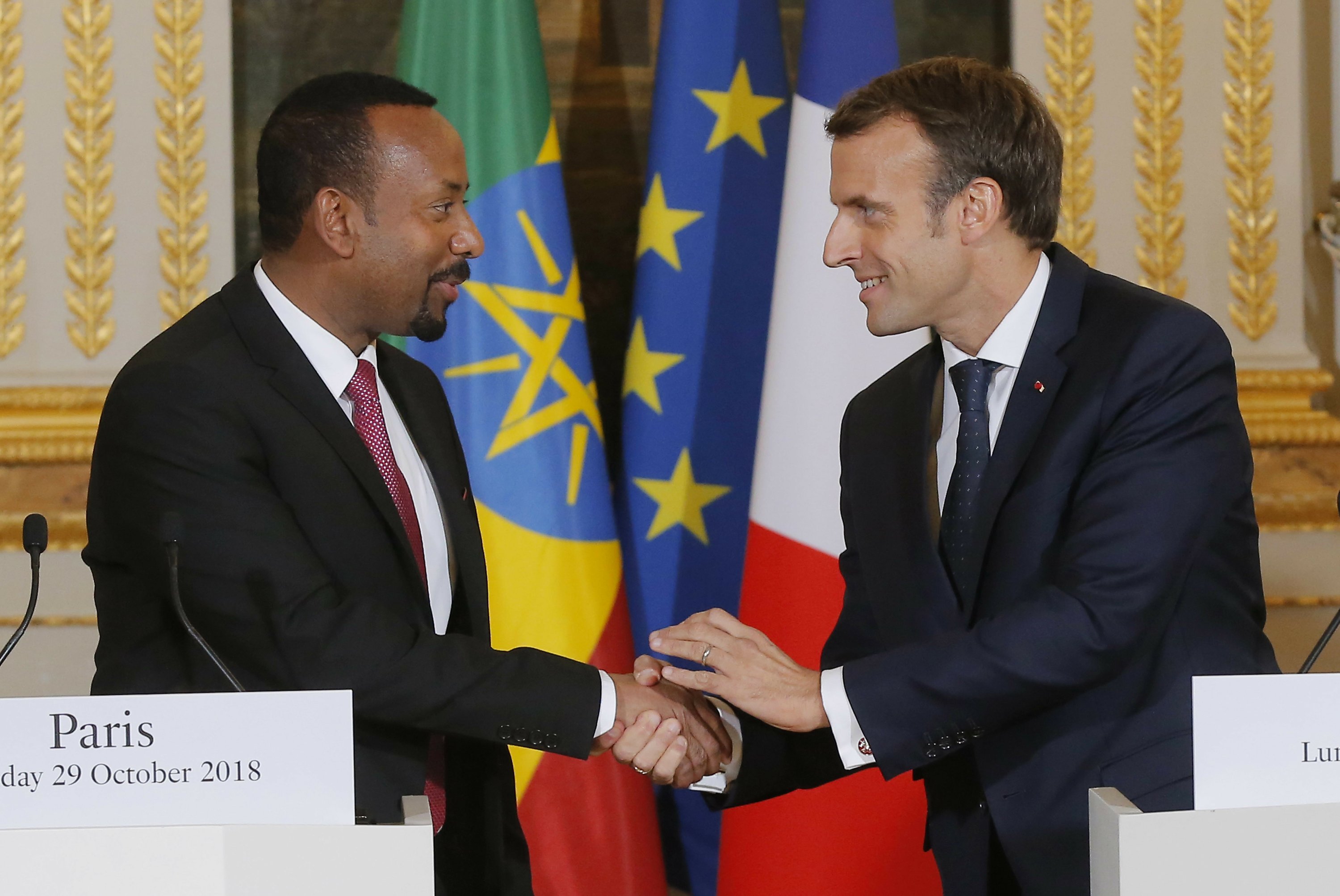 French president backs Ethiopia leader's sweeping reforms AP News