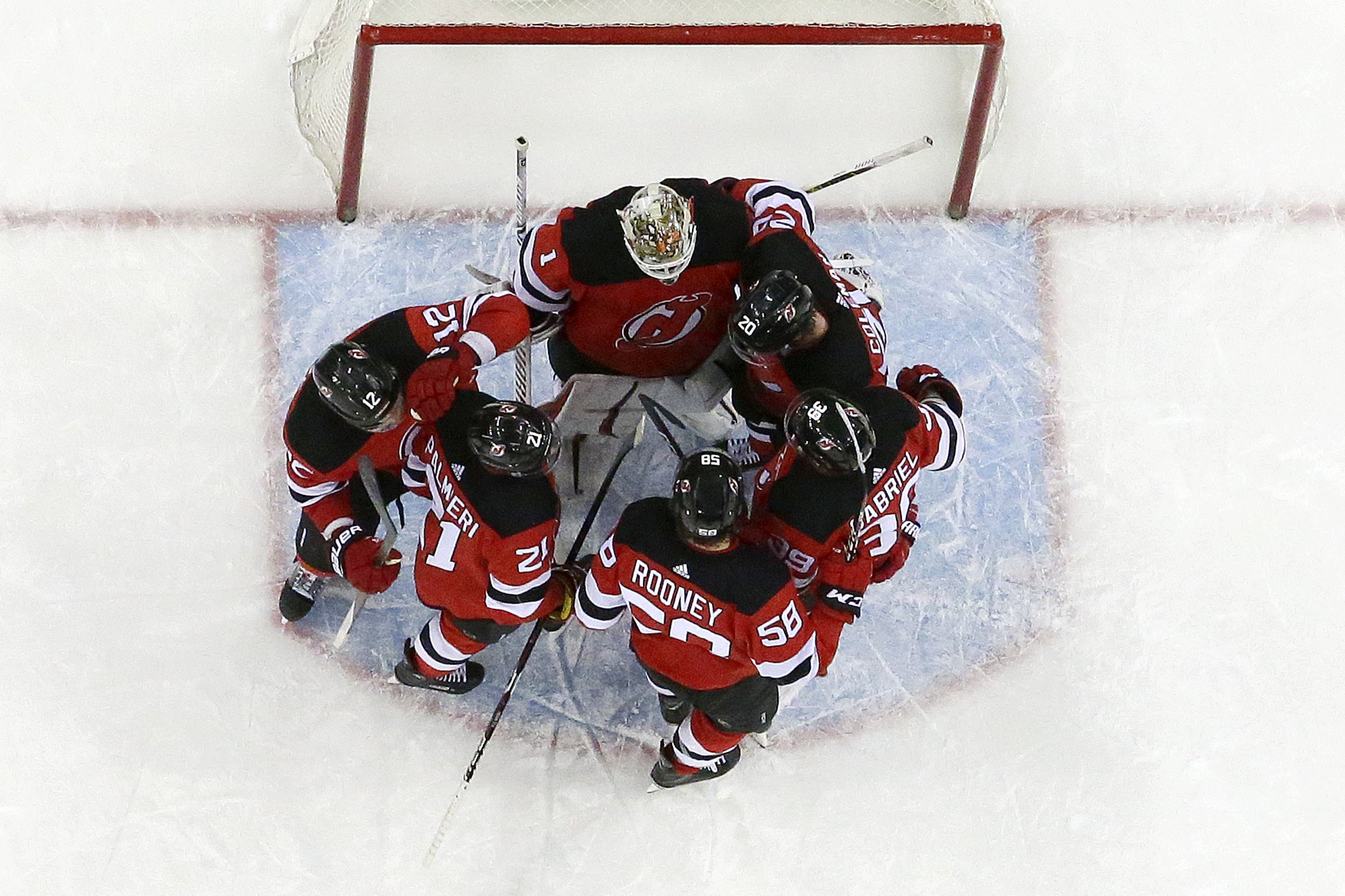 Johansson scores twice, Devils beat Hurricanes 32 AP News