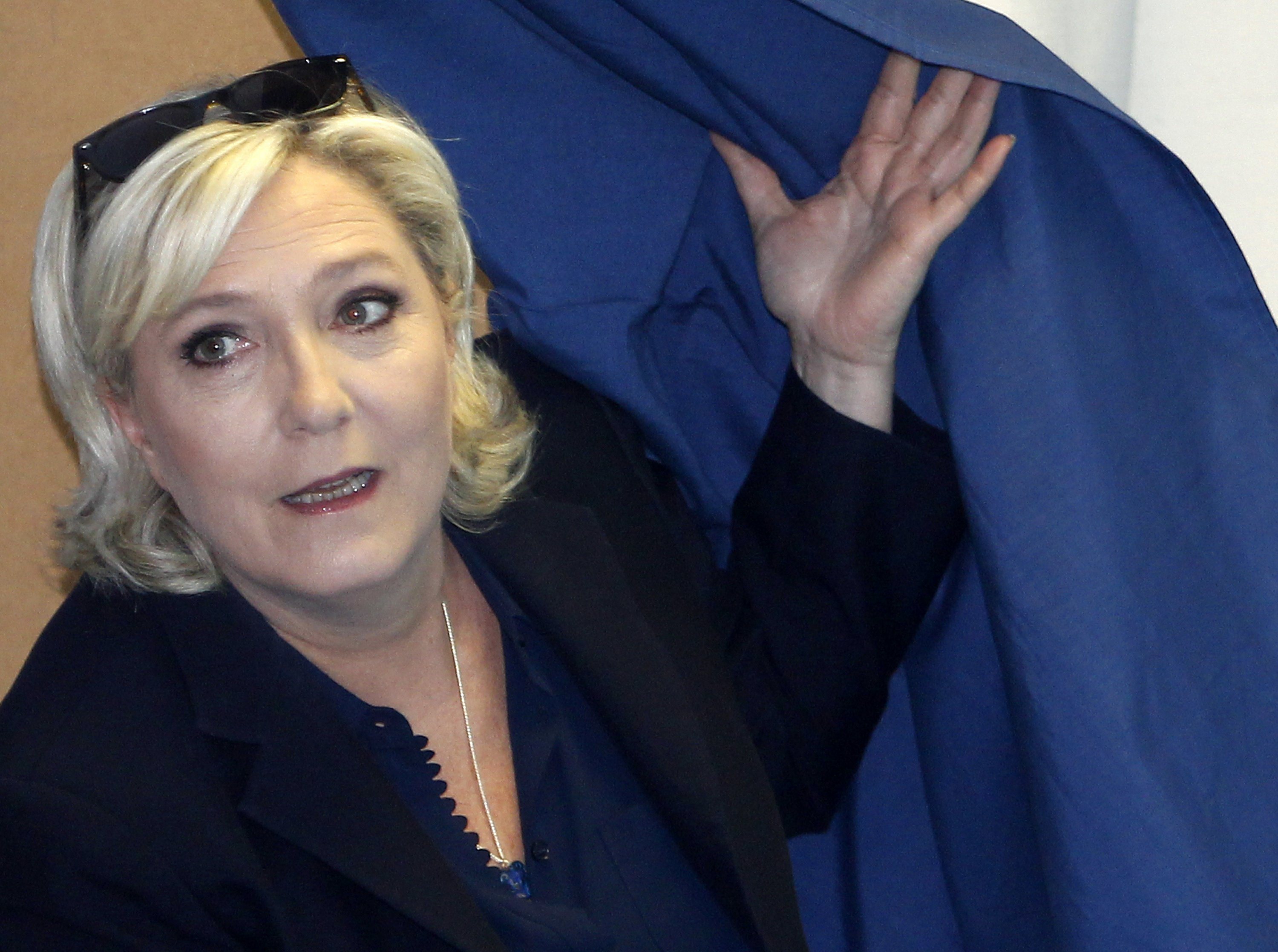 French far-right leader Marine Le Pen charged over IS photos | AP News