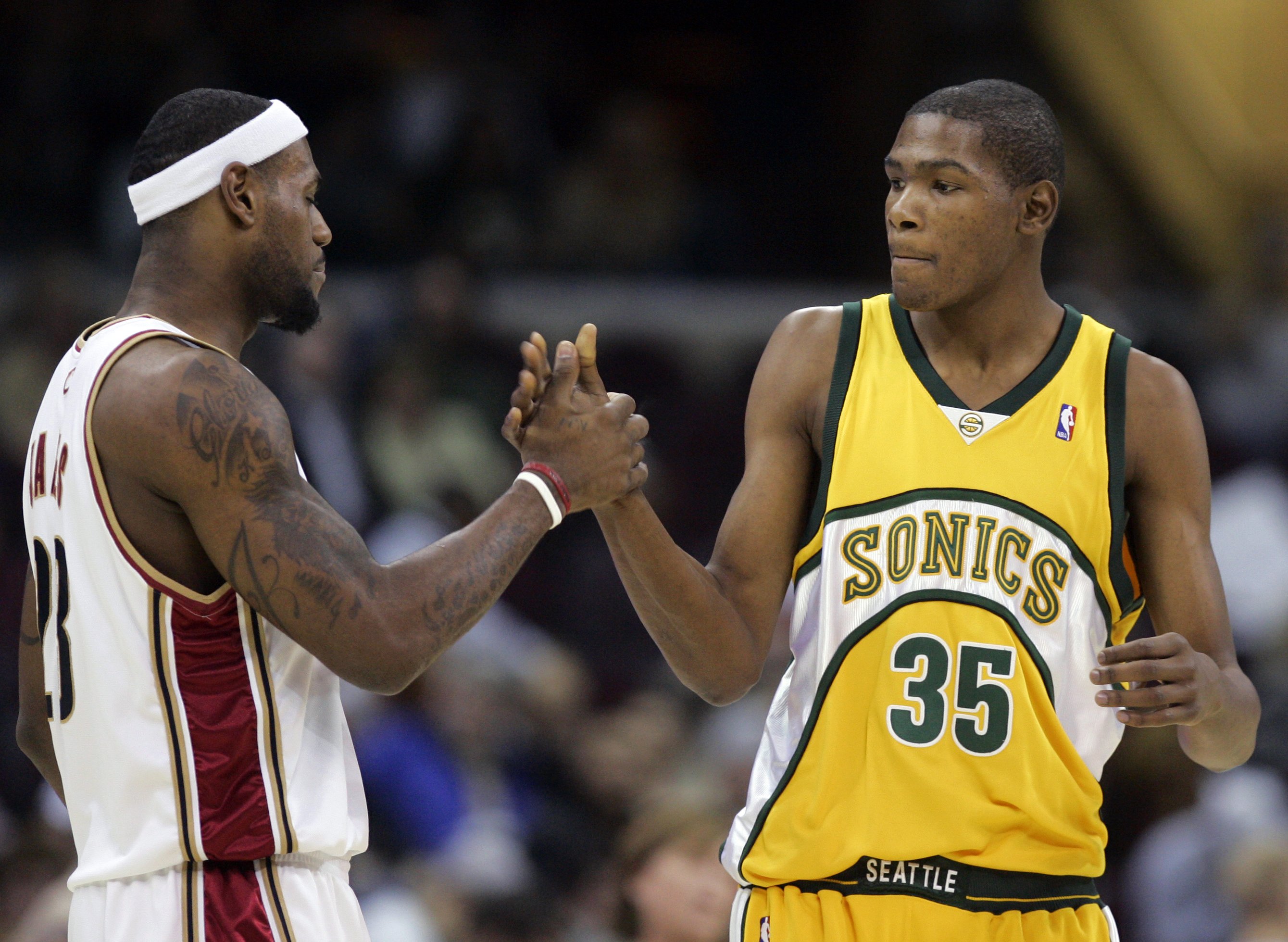 lebron james holding a basketball