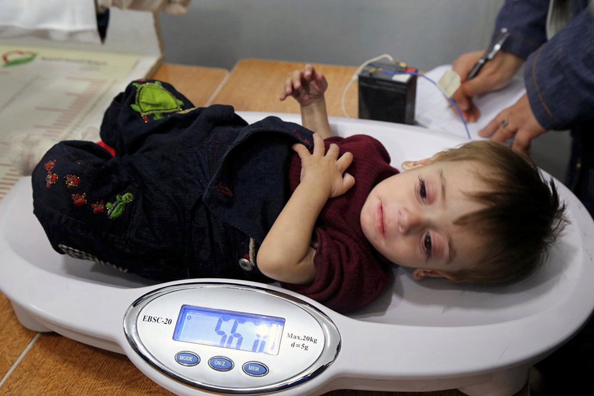 Hunger at Damascus' door as Syrian government blocks aid AP News