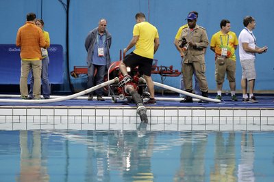 Out Of Options Olympic Officials Drain Green Pool