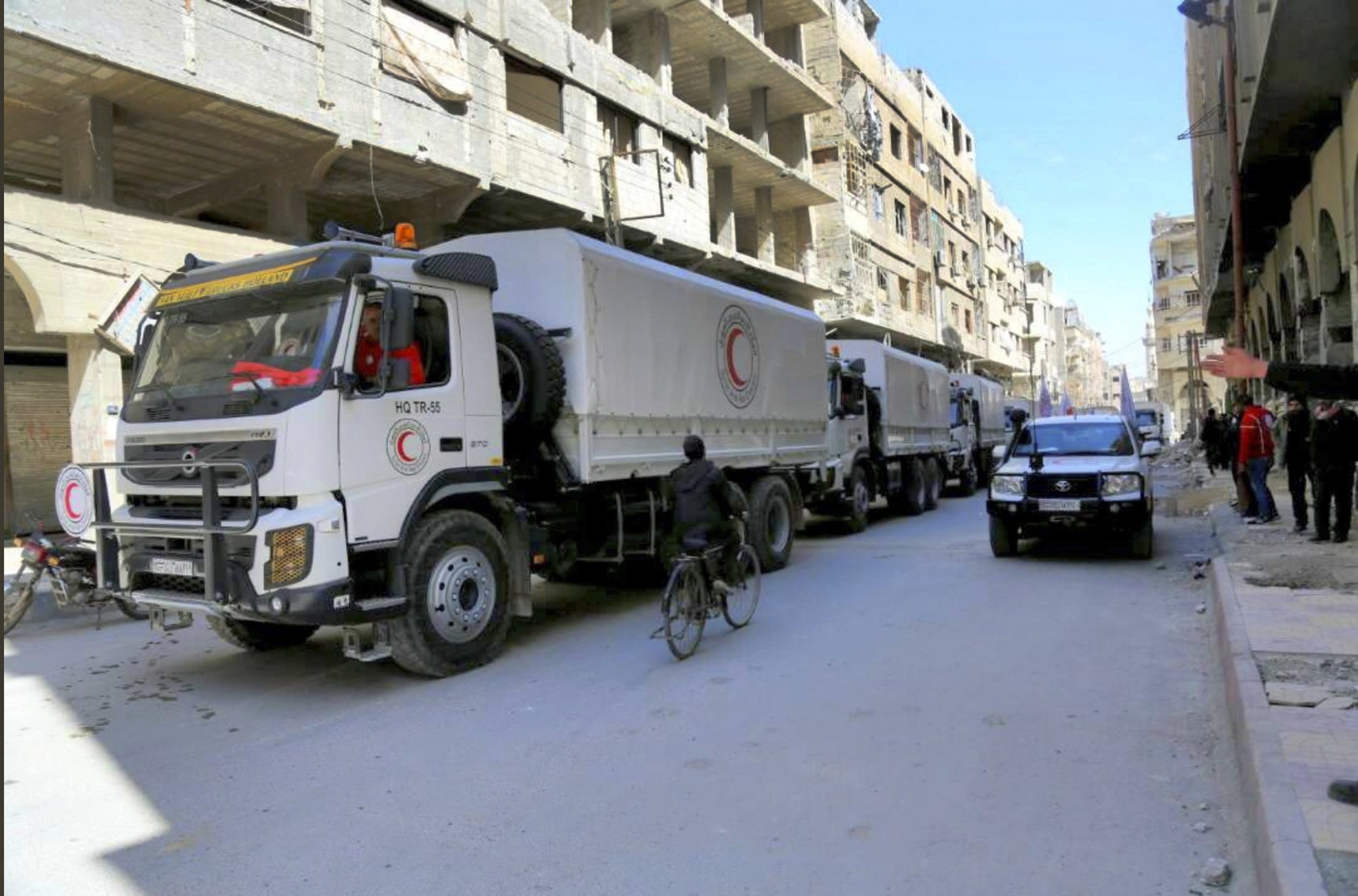 Aid delivered to Syria's Ghouta amid renewed violence | AP News