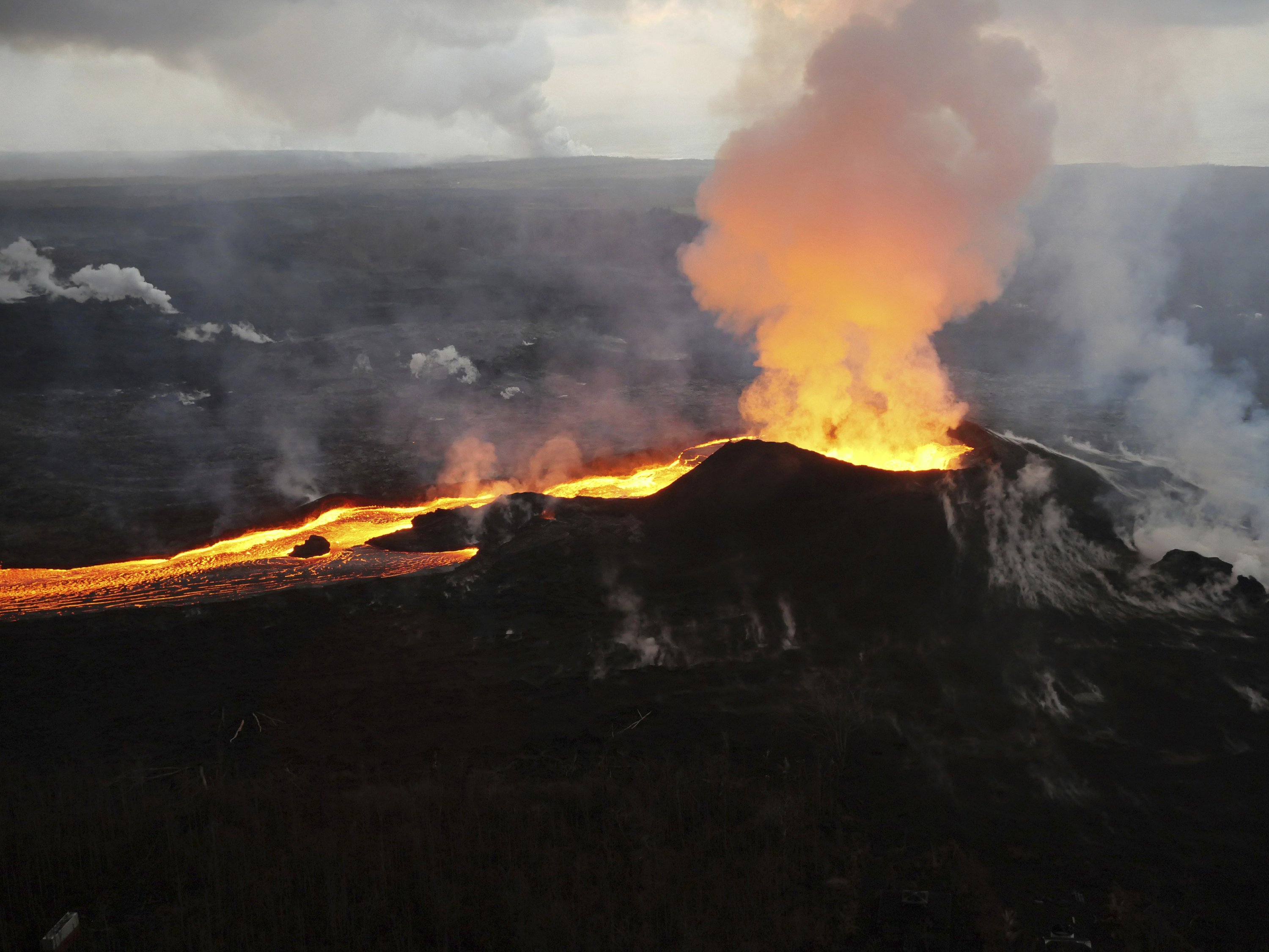 Scientists lower alert level for Hawaii's Kilauea volcano AP News