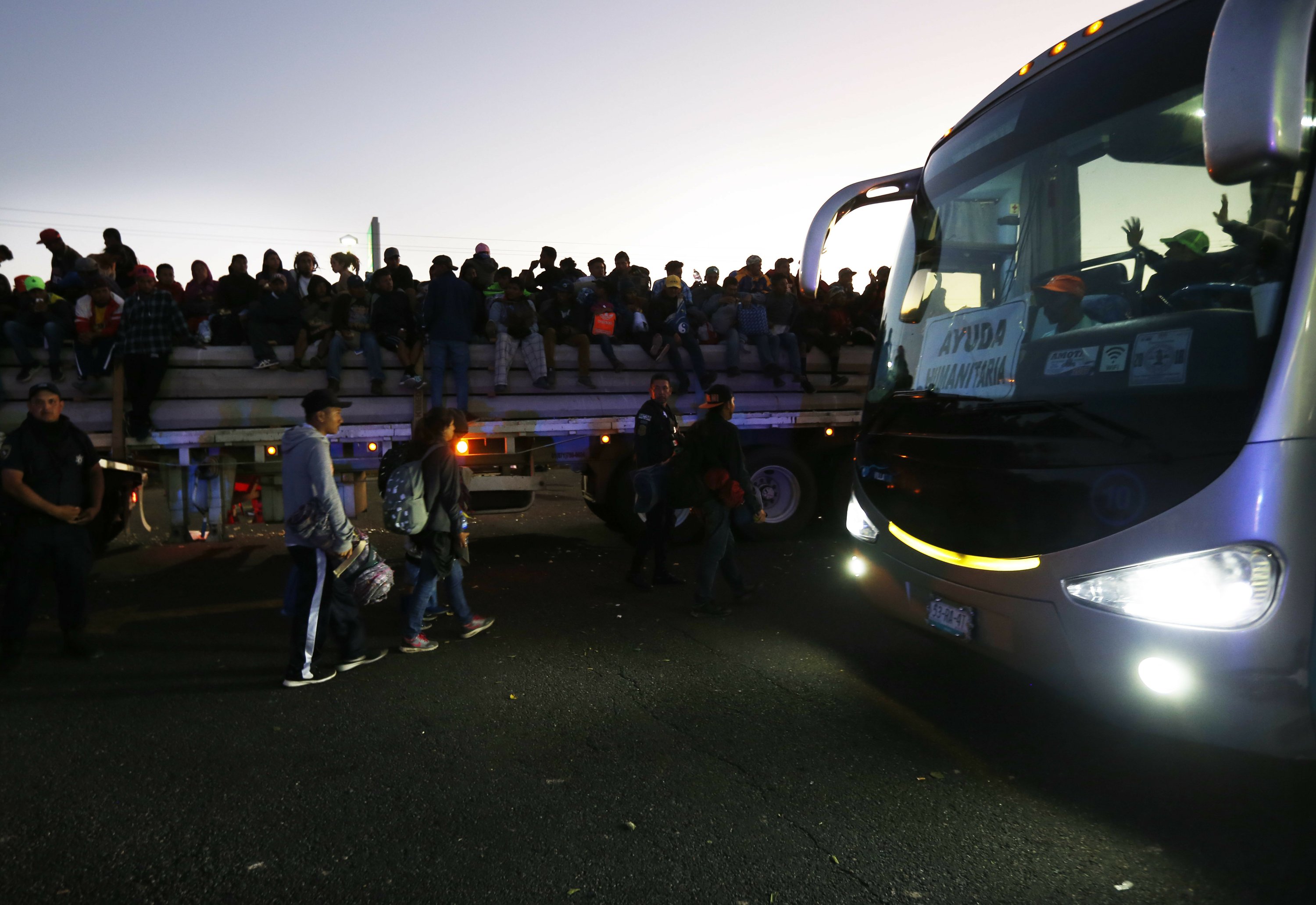 Migrant caravan groups arrive by hundreds at US border AP News