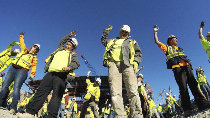 Bucks Arena Workers Stretch Bend Before Hitting Job