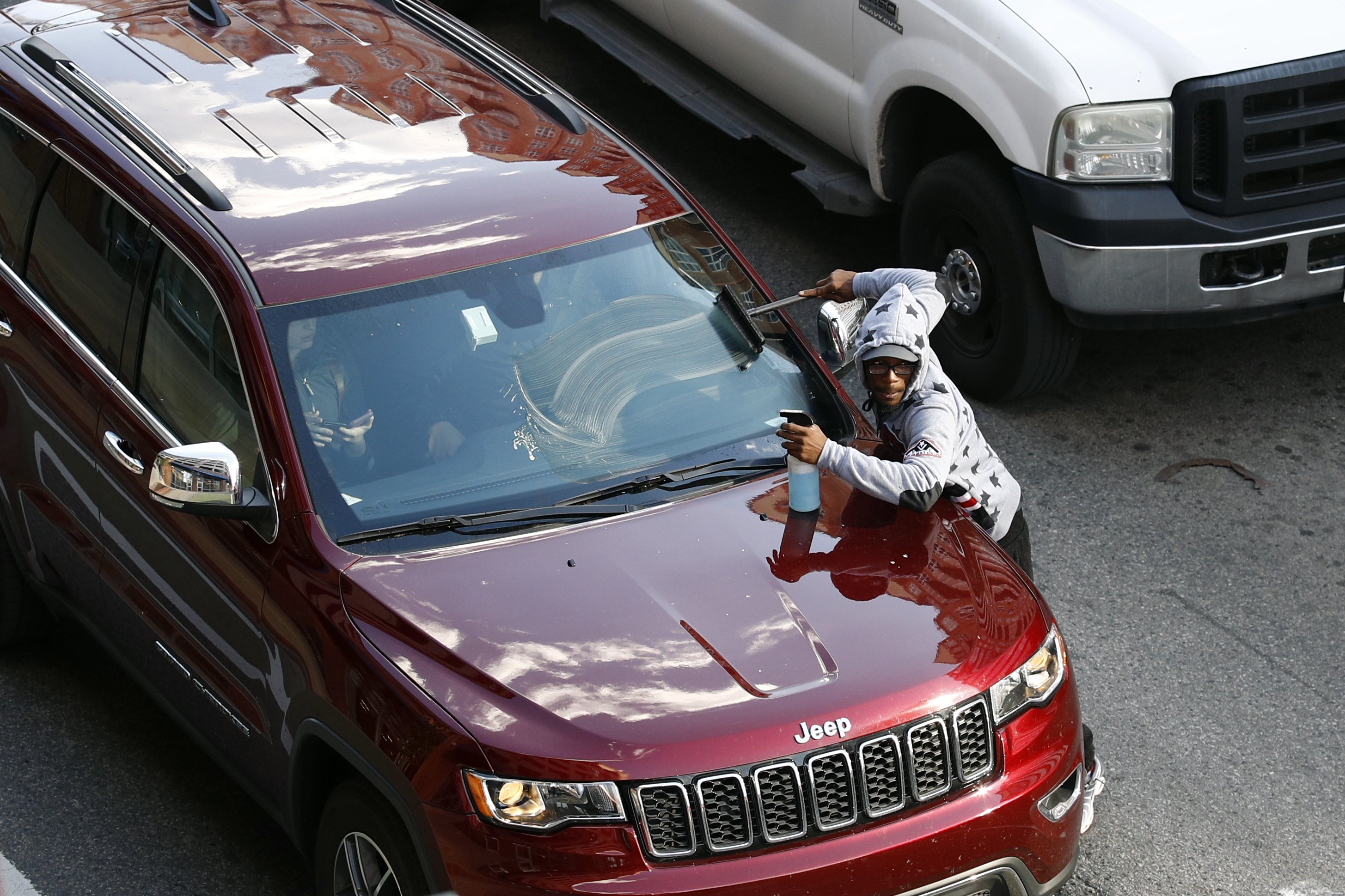 Baltimore program to steer 'squeegee kids' to other work AP News