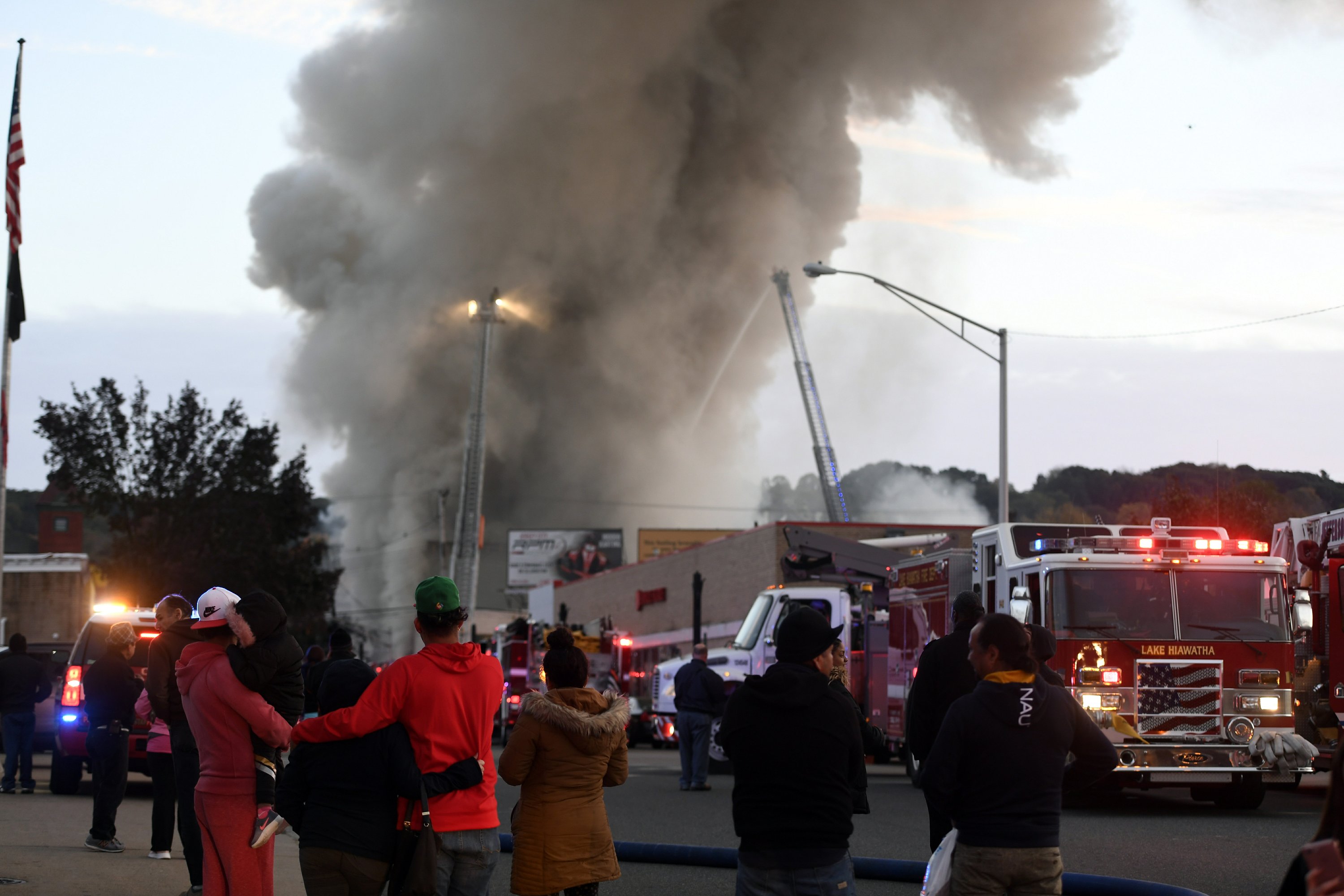 Fire fueled by gas destroys 5 buildings, displaces scores AP News