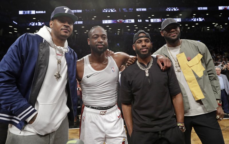 LeBron, Carmelo, Chris Paul courtside 