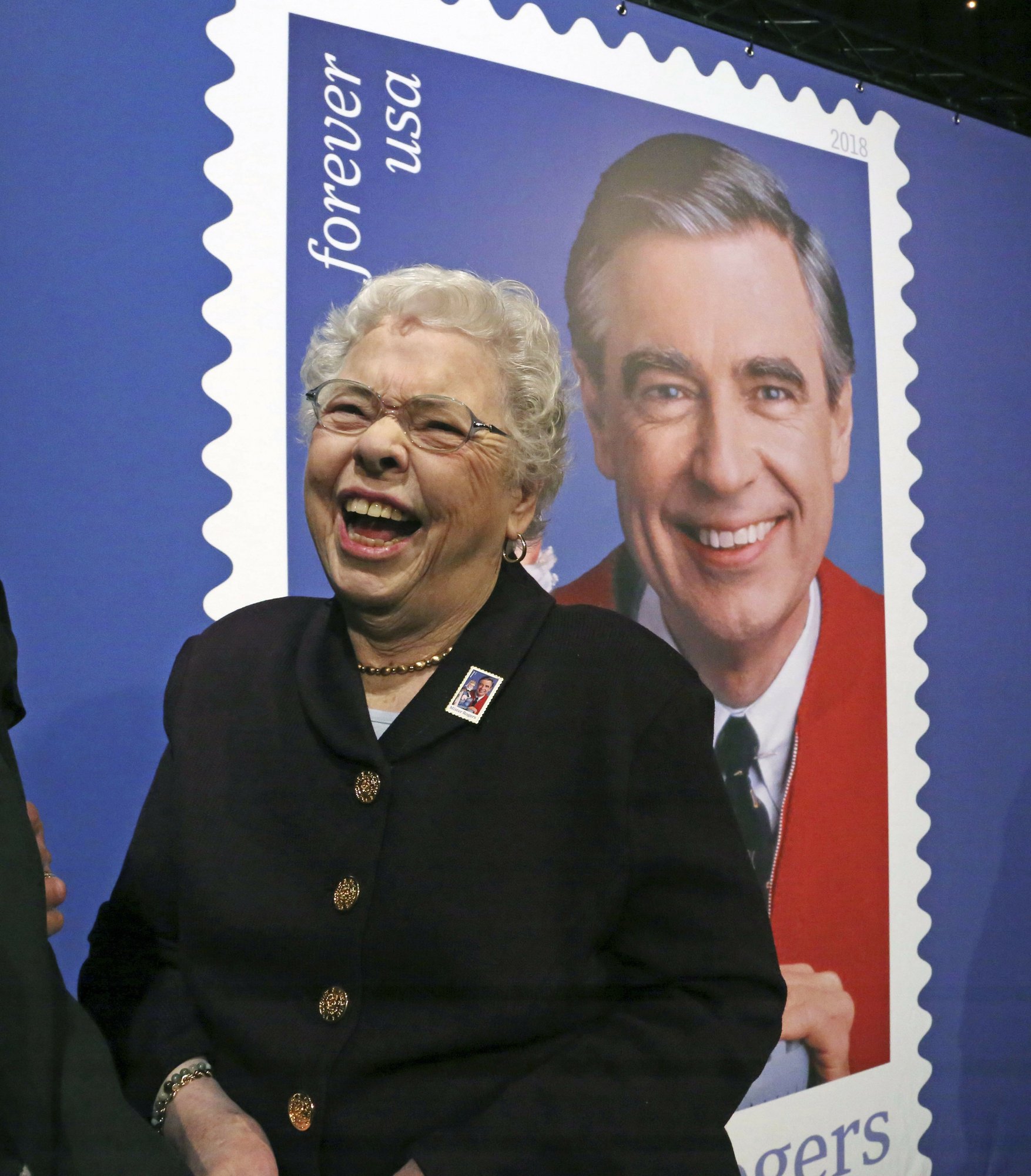 us postal service unveils mister rogers postage stamp