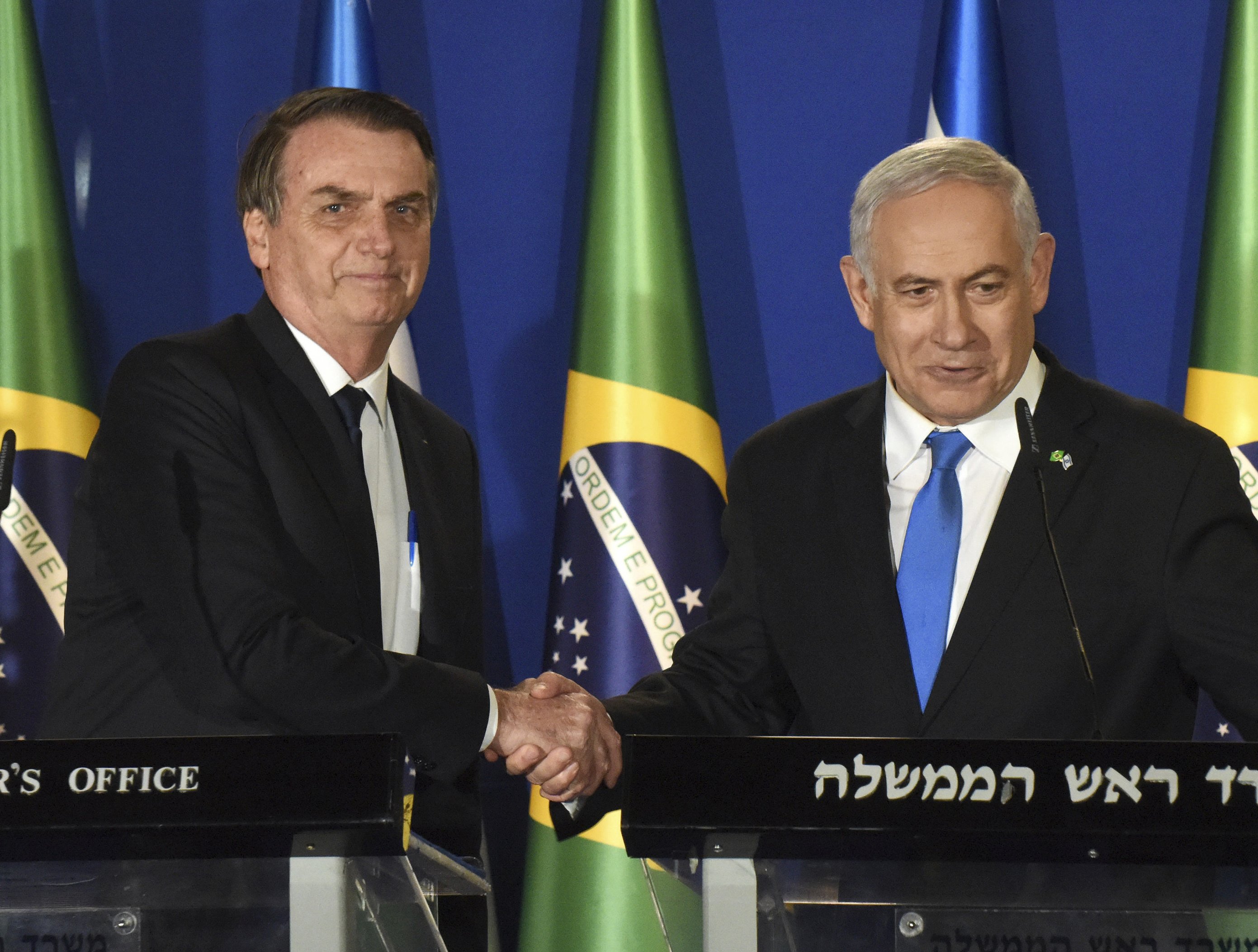 Netanyahu embraces Brazil's far-right Bolsonaro in Israel | AP News