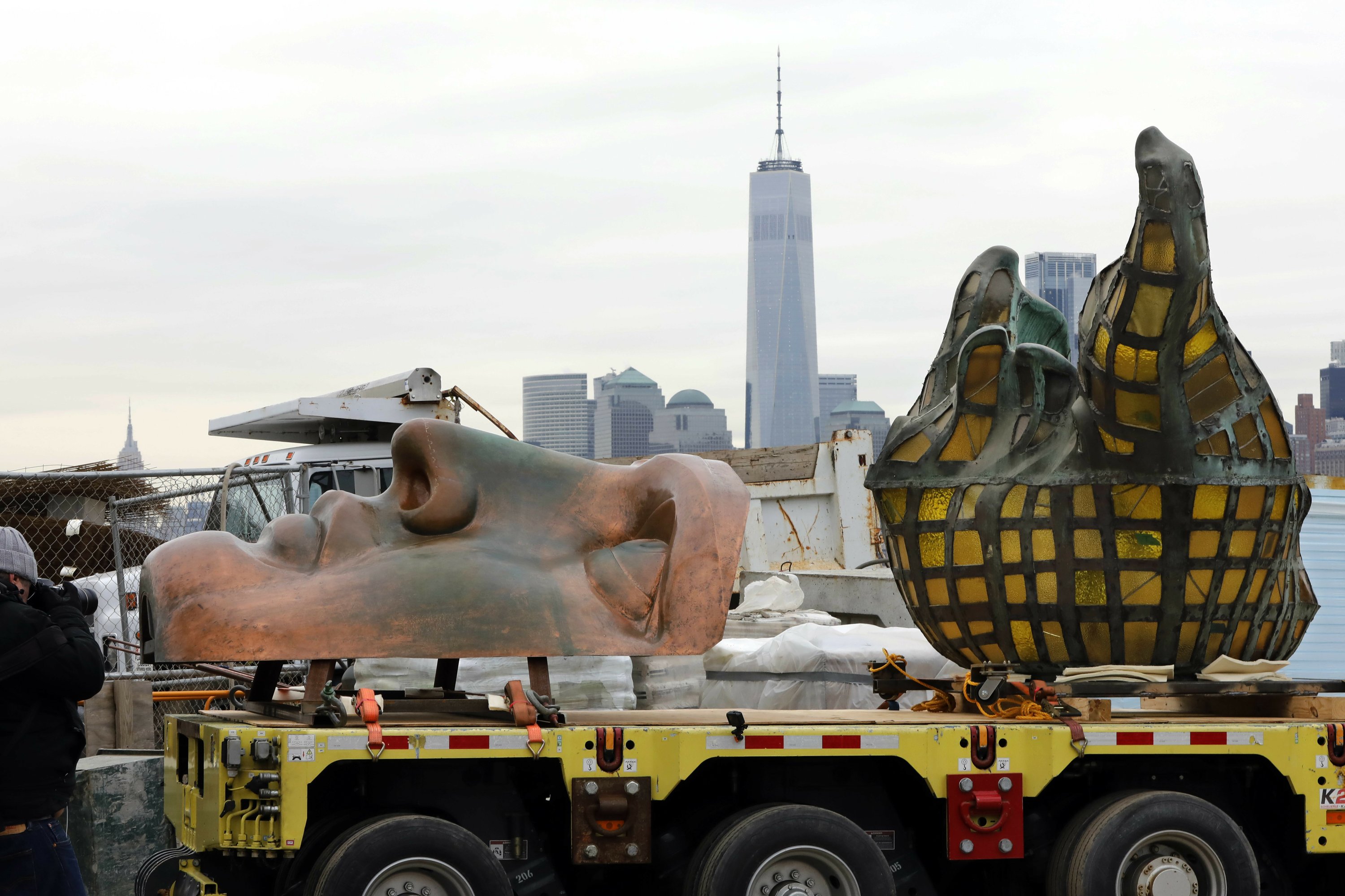 Statue of Liberty's original torch moved to museum site AP News