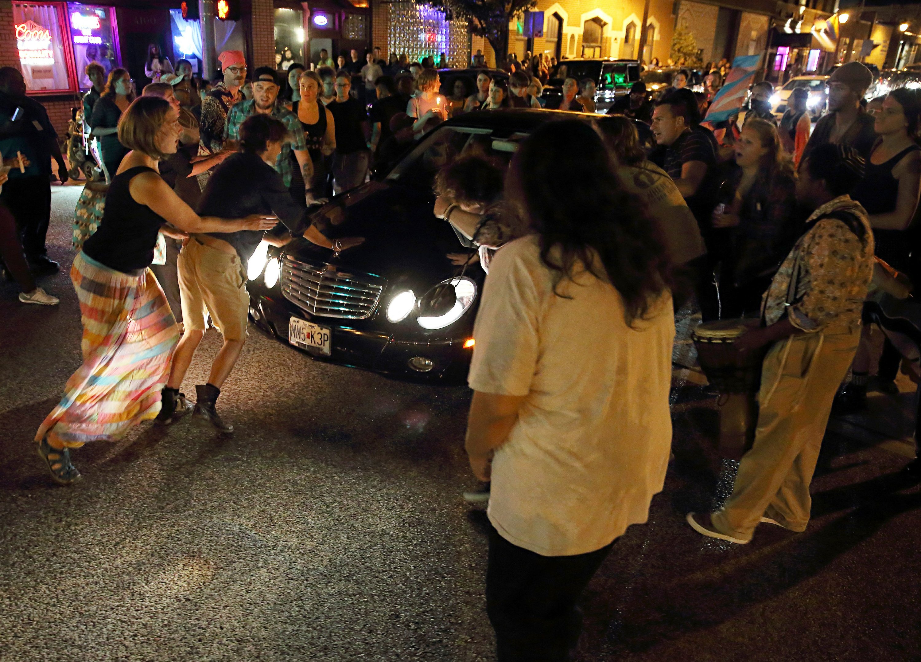 Man charged after car pulls into St. Louis rally, hurting 3