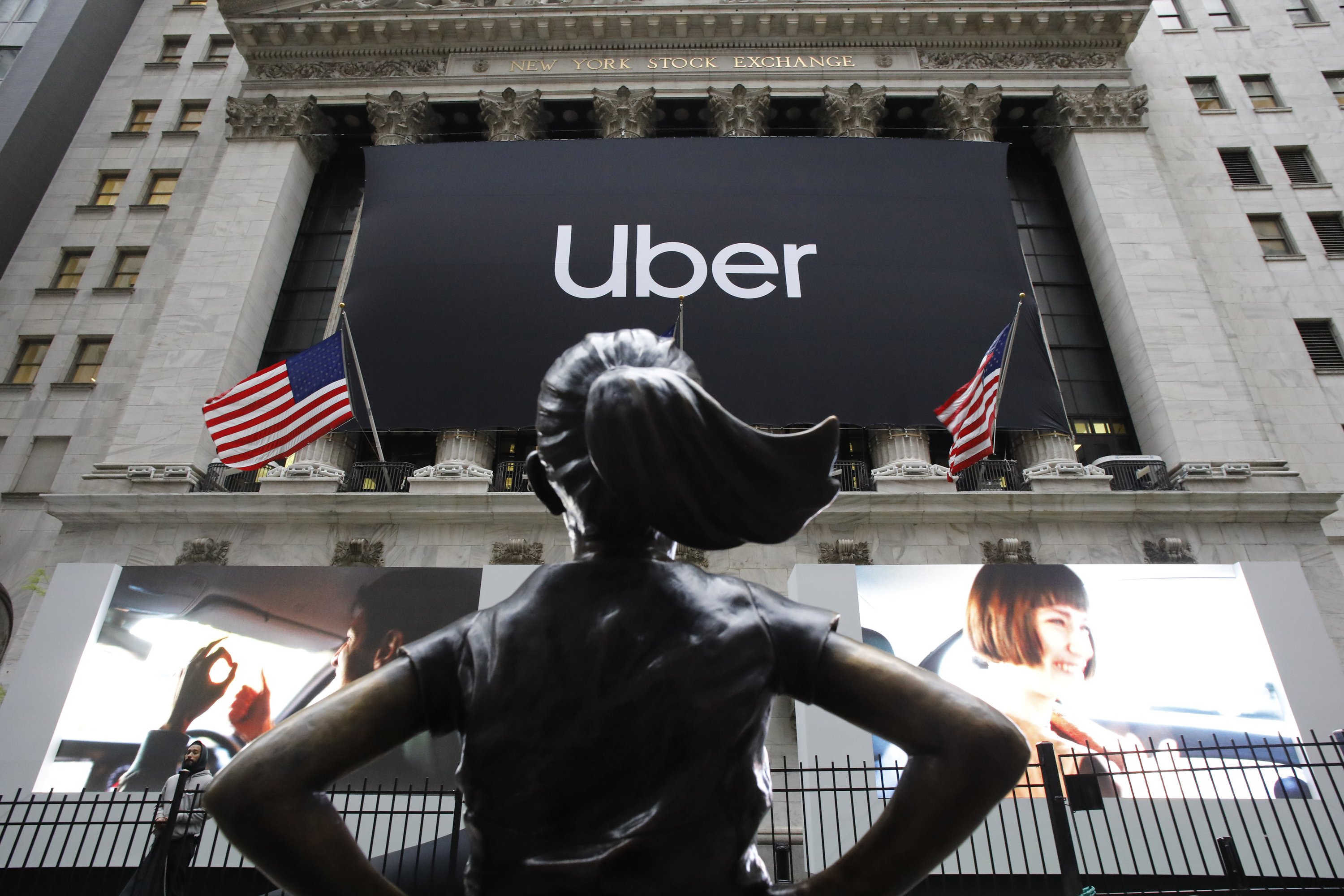 The Latest: Uber stock slides almost 8% on rocky first day  AP News