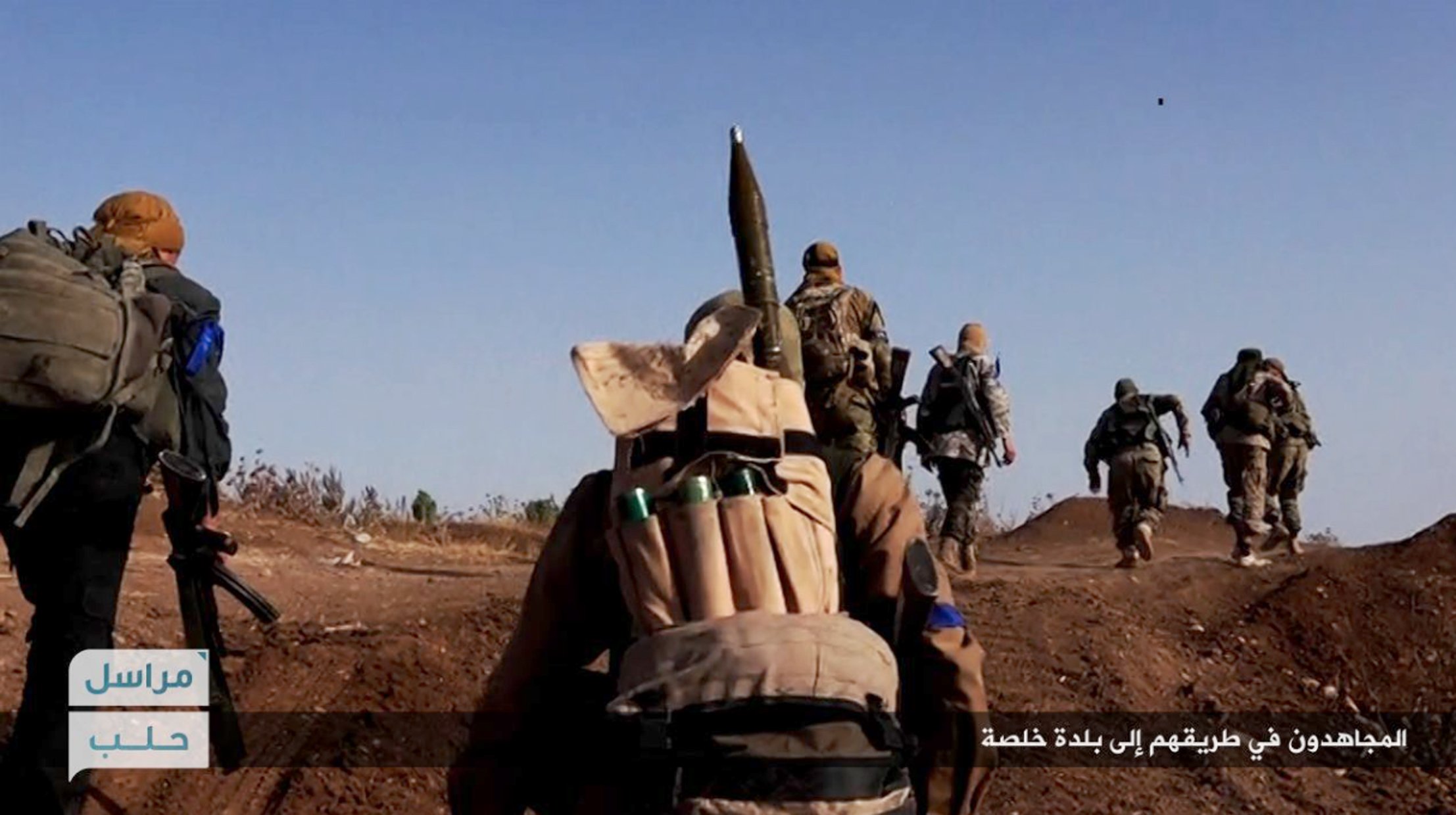 Syria activists say airstrikes on IS-held Raqqa kill 18