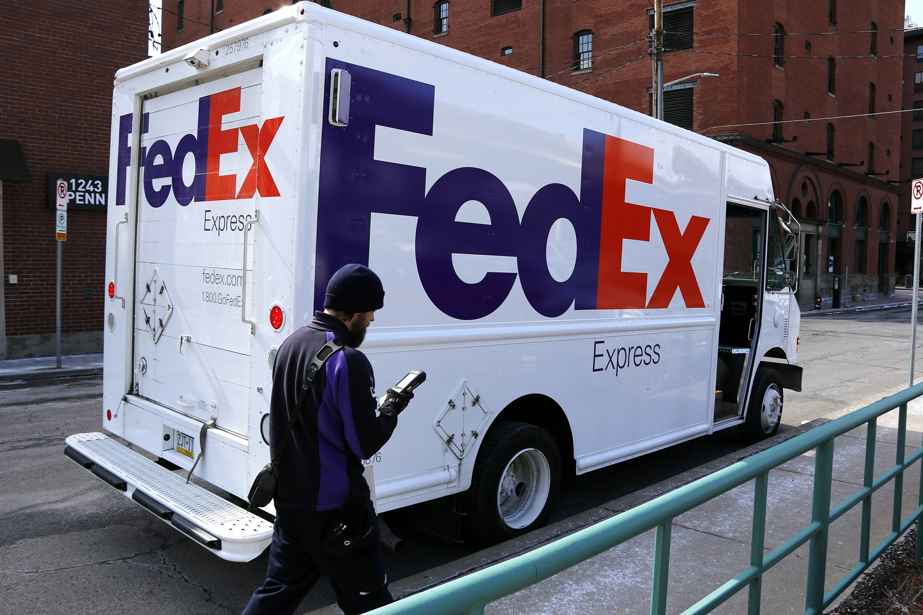 FedEx to give wage increases, bonuses to workers AP News